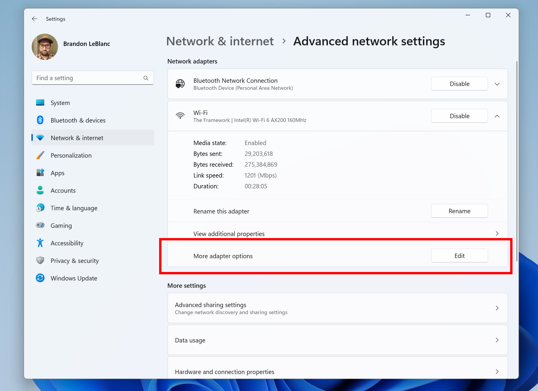 Screenshot of Windows 11 Settings app showing advanced network settings and a button to view advanced adapter options, which is highlighted