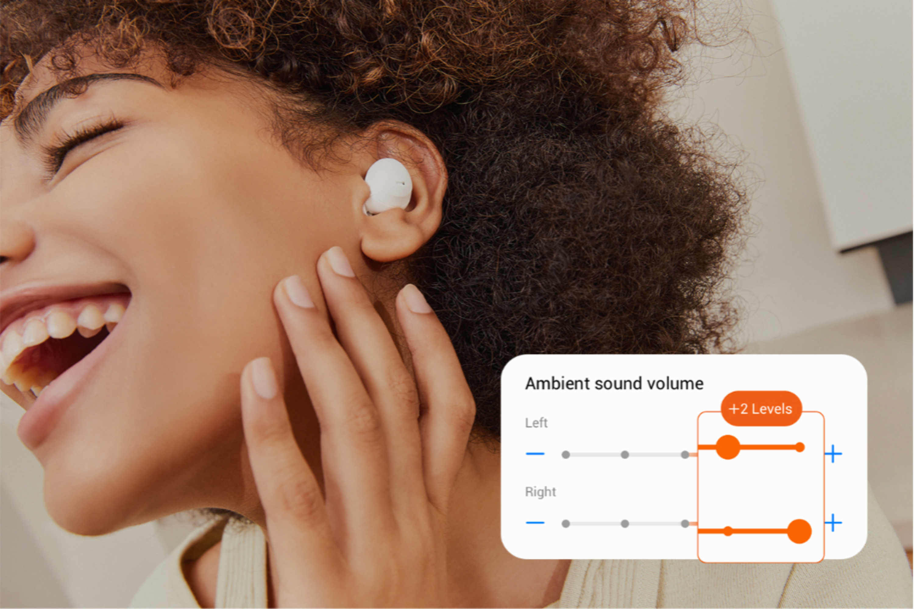 woman using Samsung Galaxy Buds 2 Pro with enhanced Ambient Sound mode