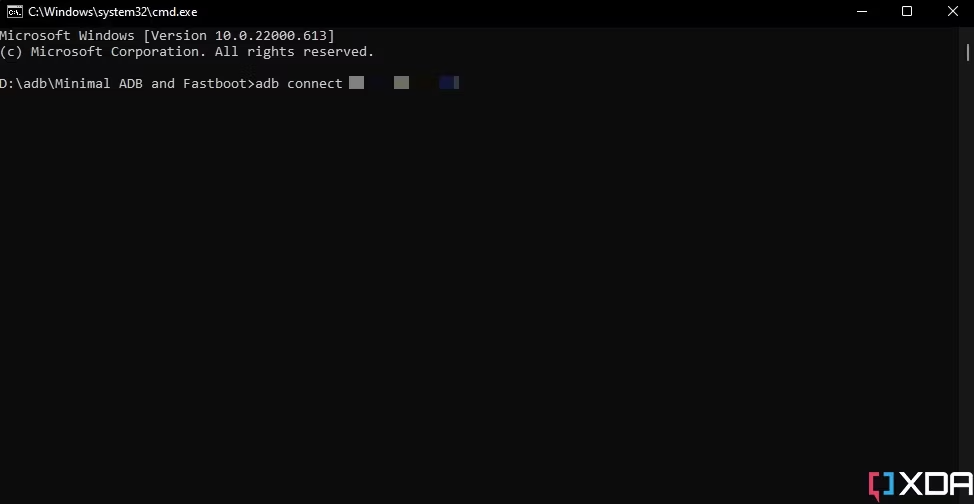 Screenshot of command prompt window with adb connect command.