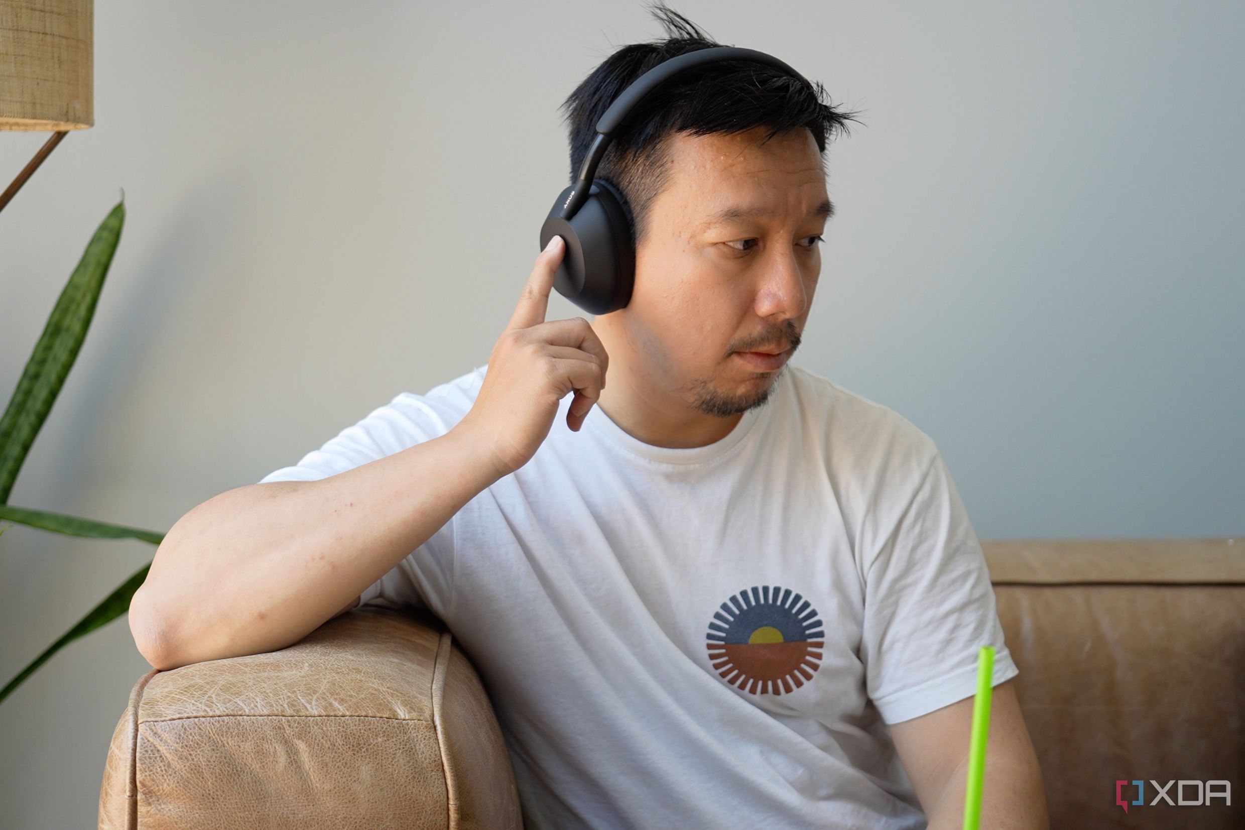 A person listening to music on the Sony WH-1000XM5 