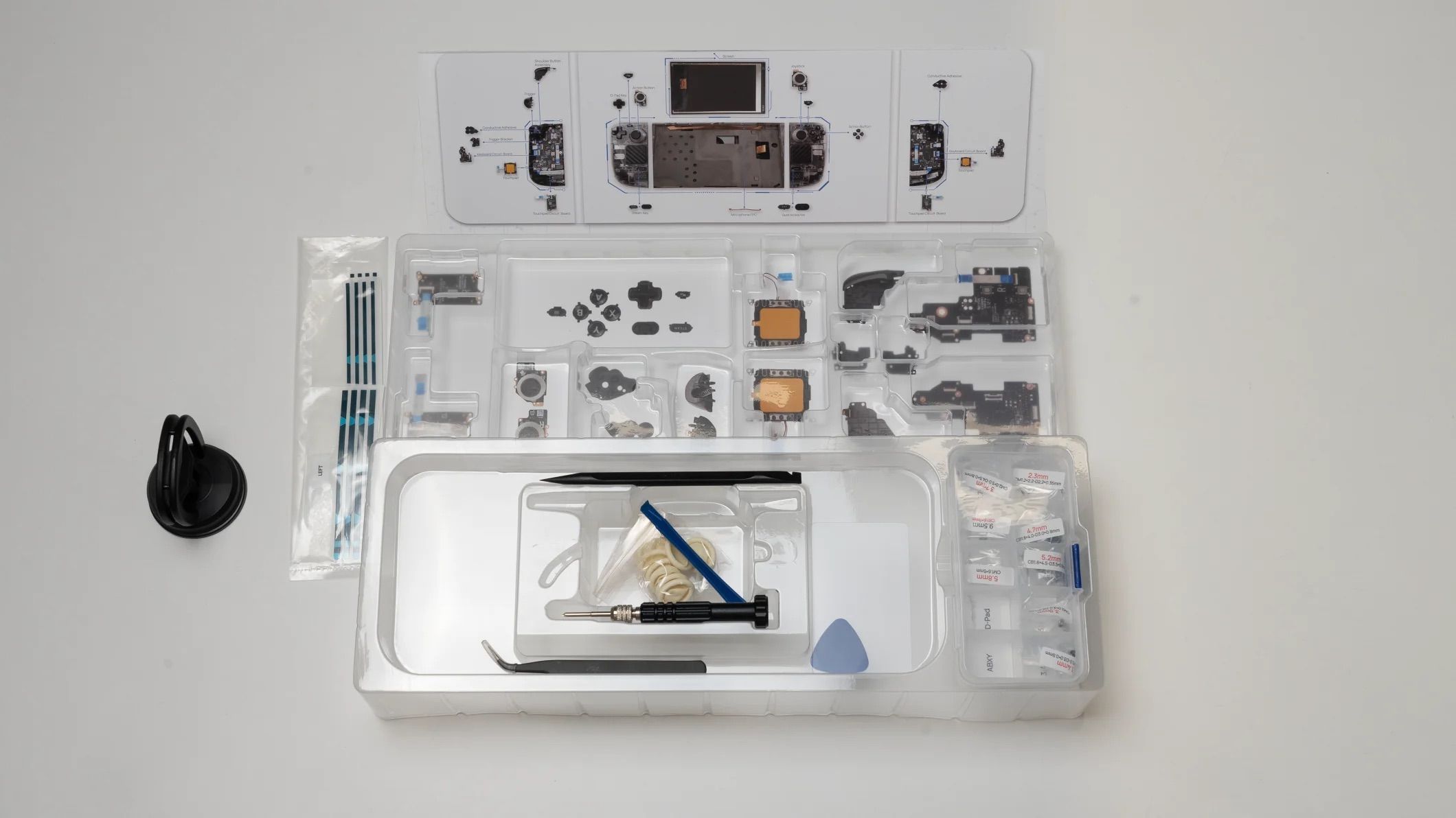 JSAUX Steam Deck Clear Front Shell Replacement Kit with Tools and Various Packaging Shown. 