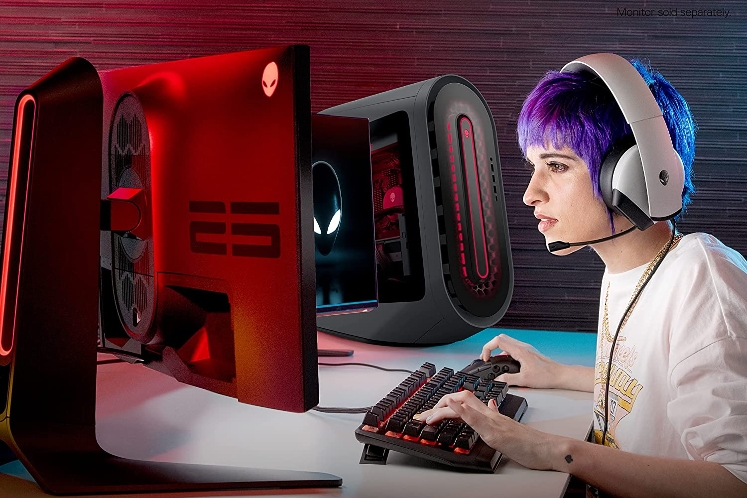 alienware aurora r14 amd ryzen gaming pc being used by a girl with purple hair
