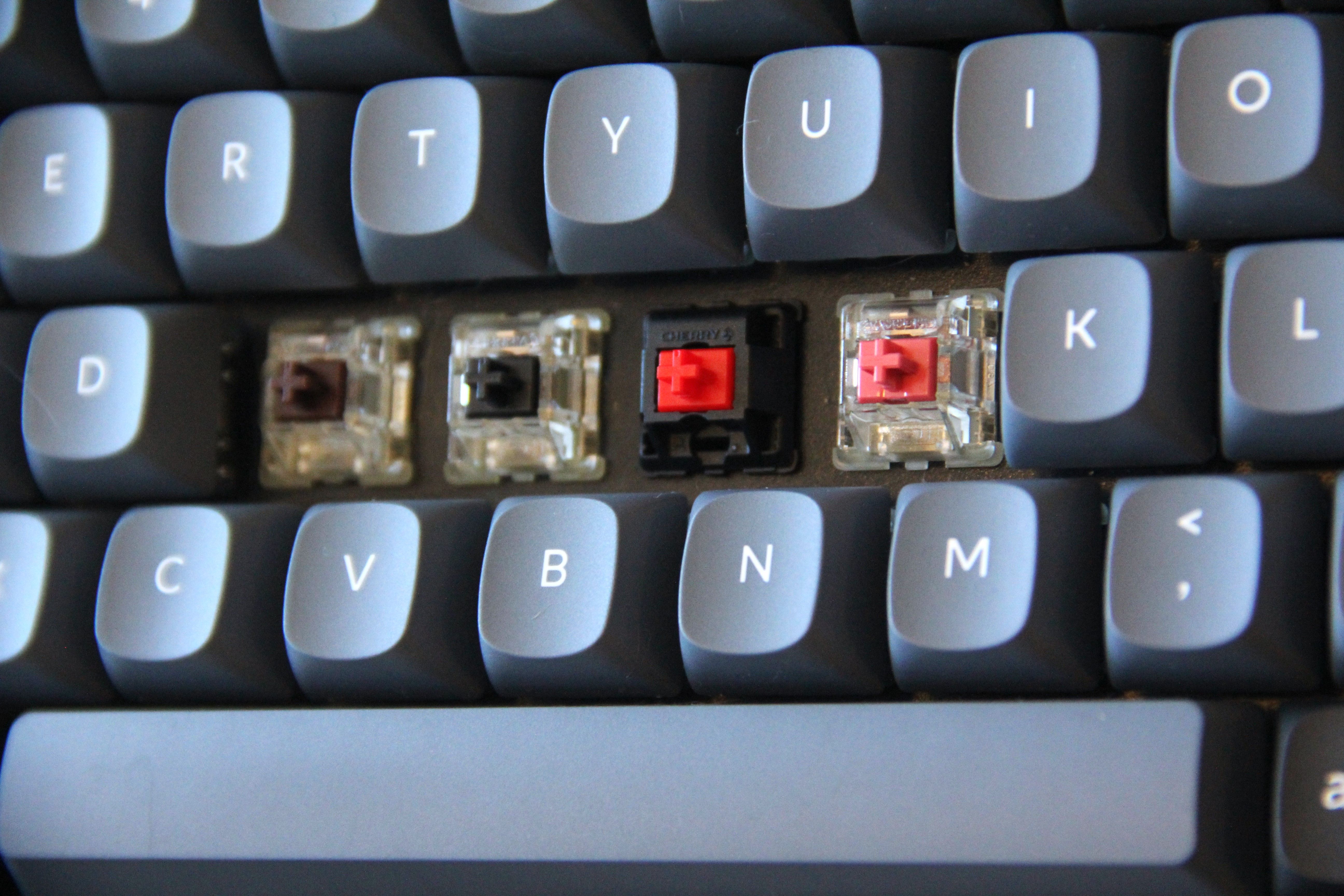 Some Cherry MX2A switches inside a keyboard