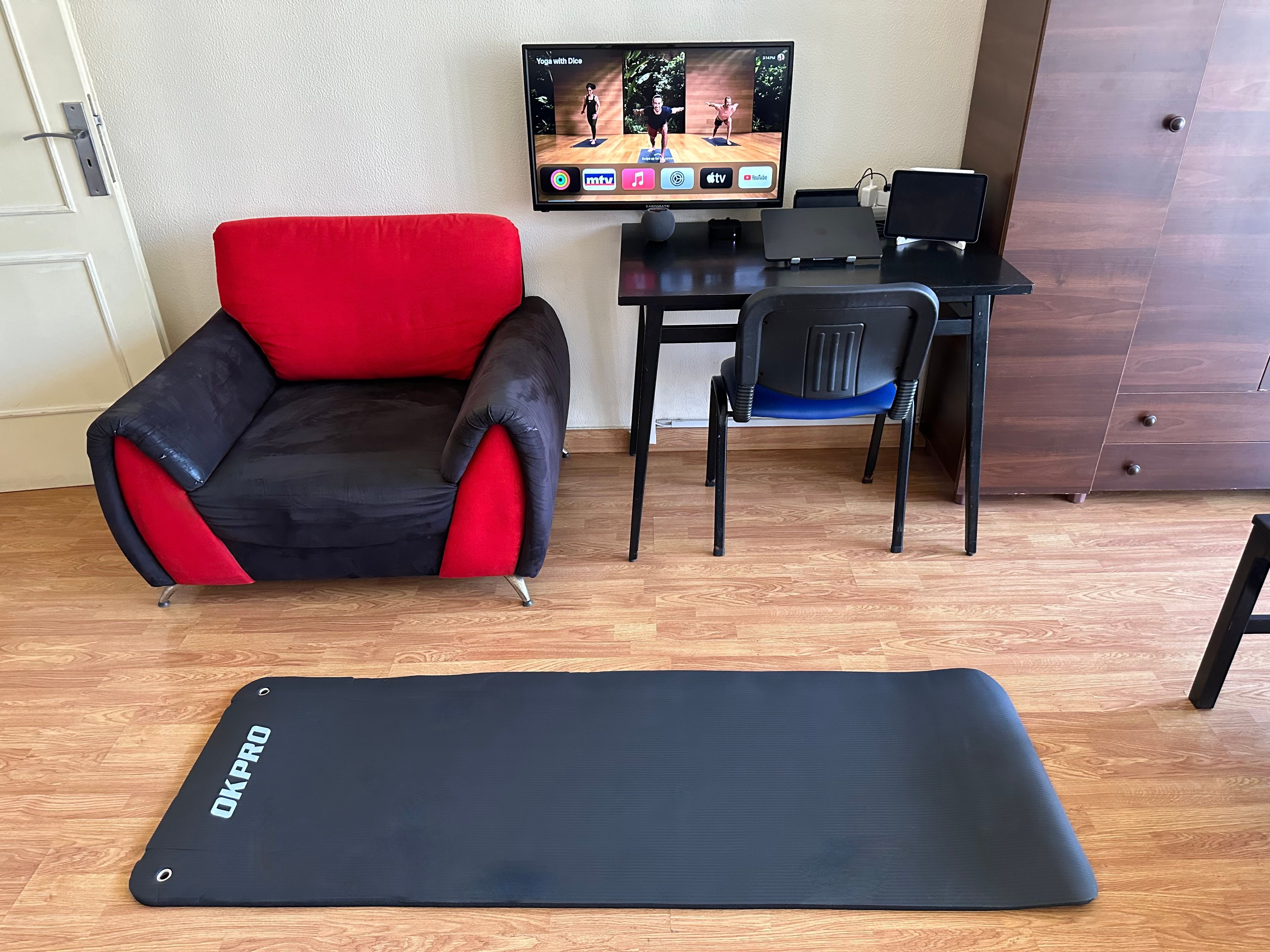 Apple TV 4K 3 showing a preview of Fitness+ workouts with an exercise mat placed on the floor