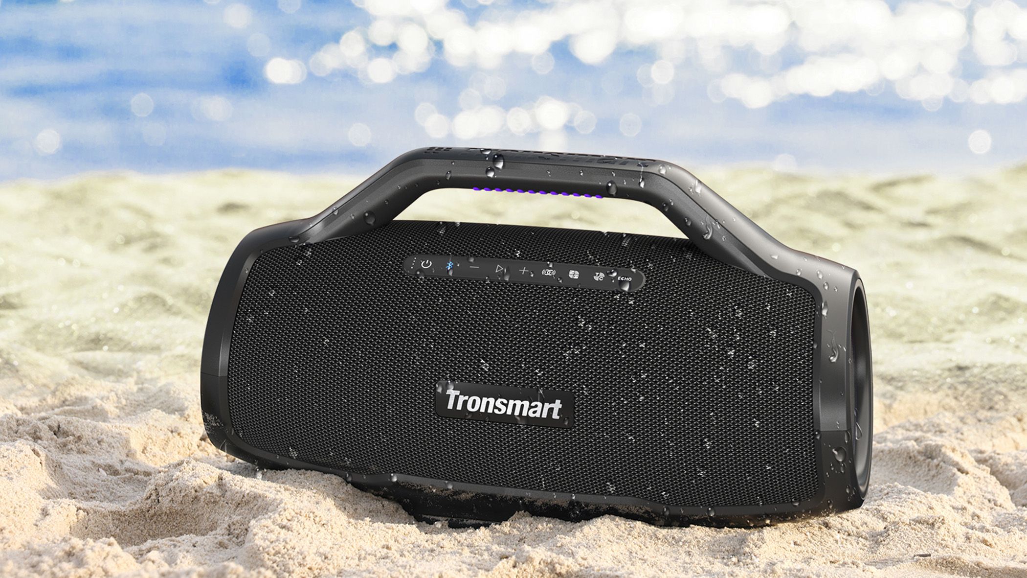 The Bang Max speaker sitting in the sand on the beach