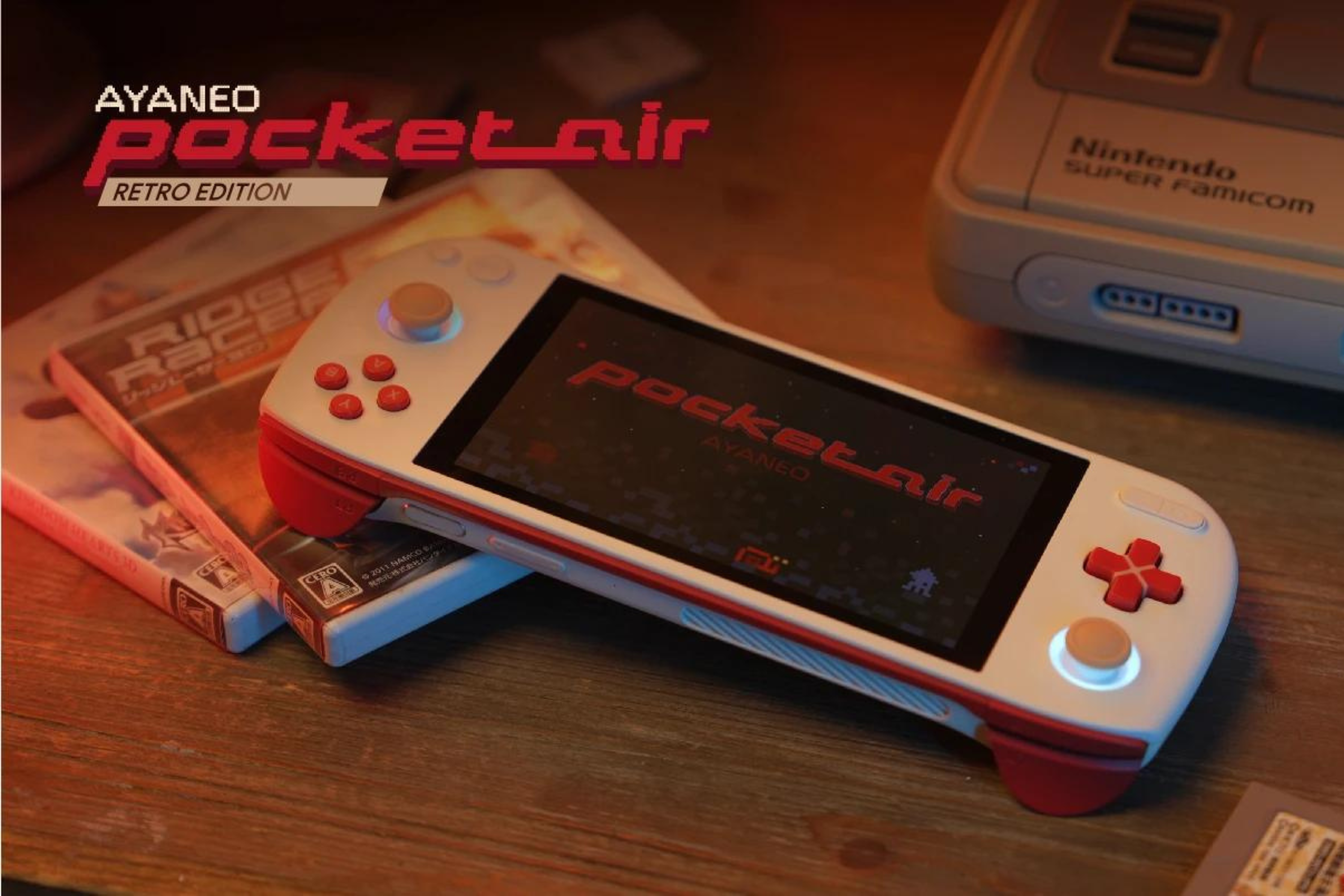 Ayaneo Pocket Air on table with retro games and consoles in background