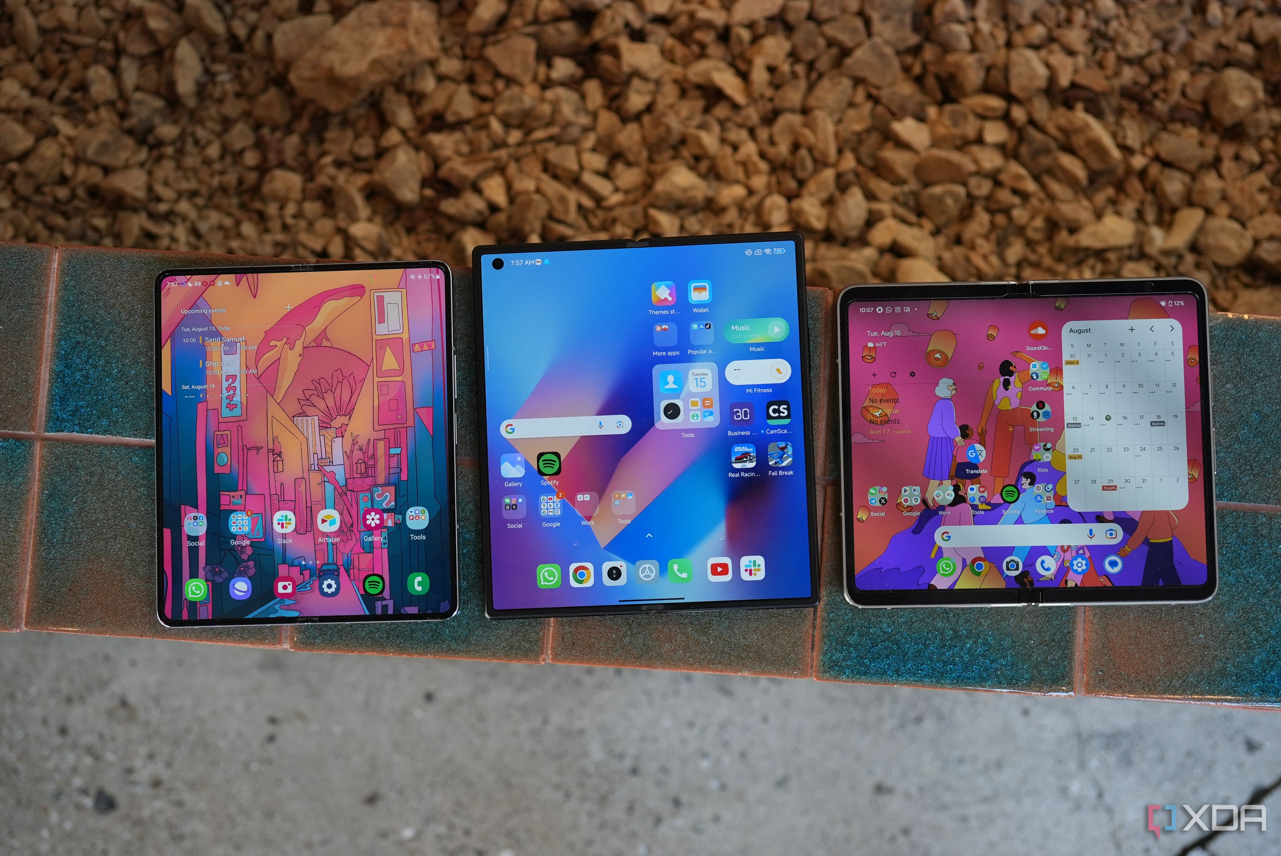 The Galaxy Z Fold 5 (left) and the Pixel Fold (right) along with the Xiaomi Mix Fold 3 (middle)
