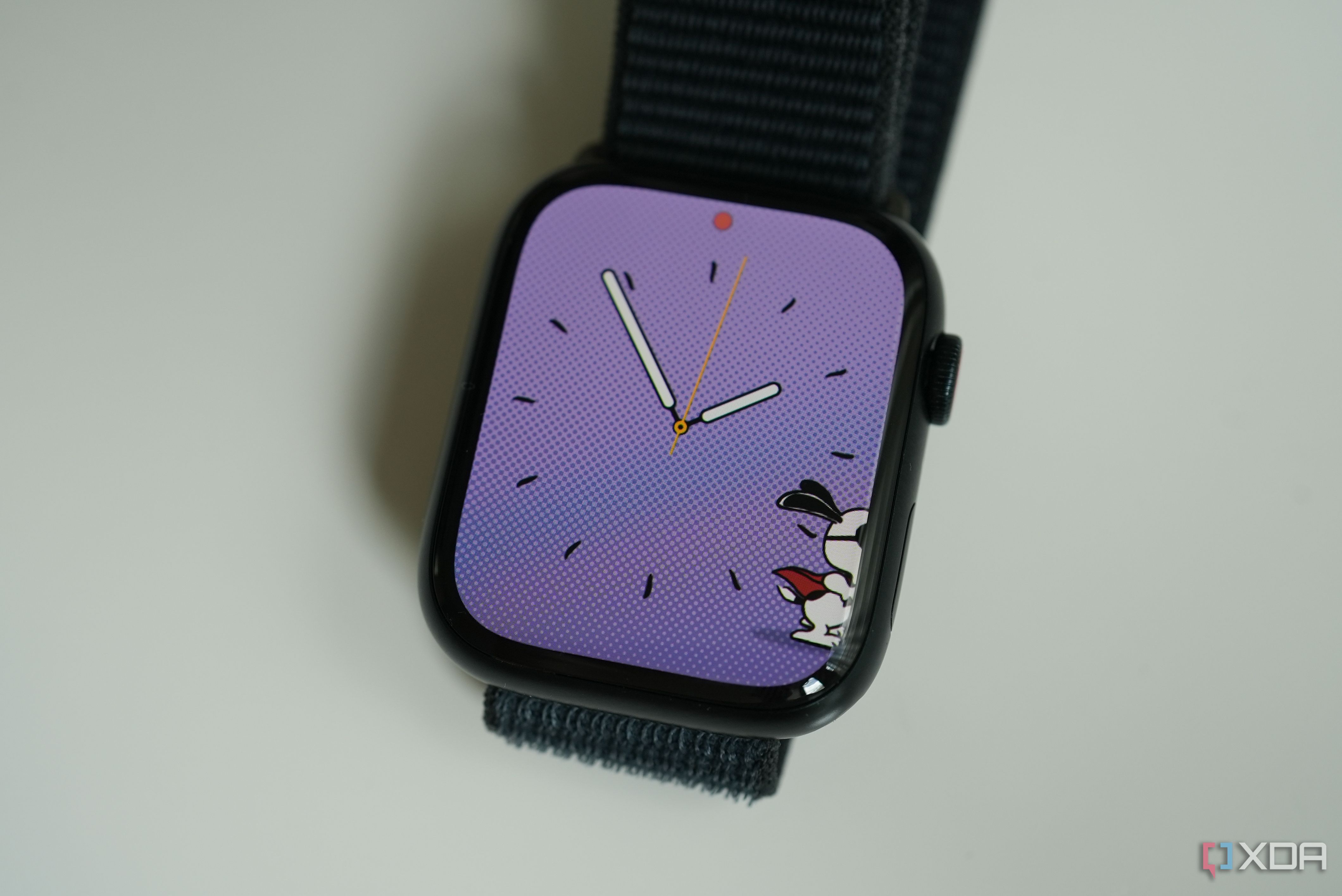 An Apple Watch Series 9 with a snoopy watch face