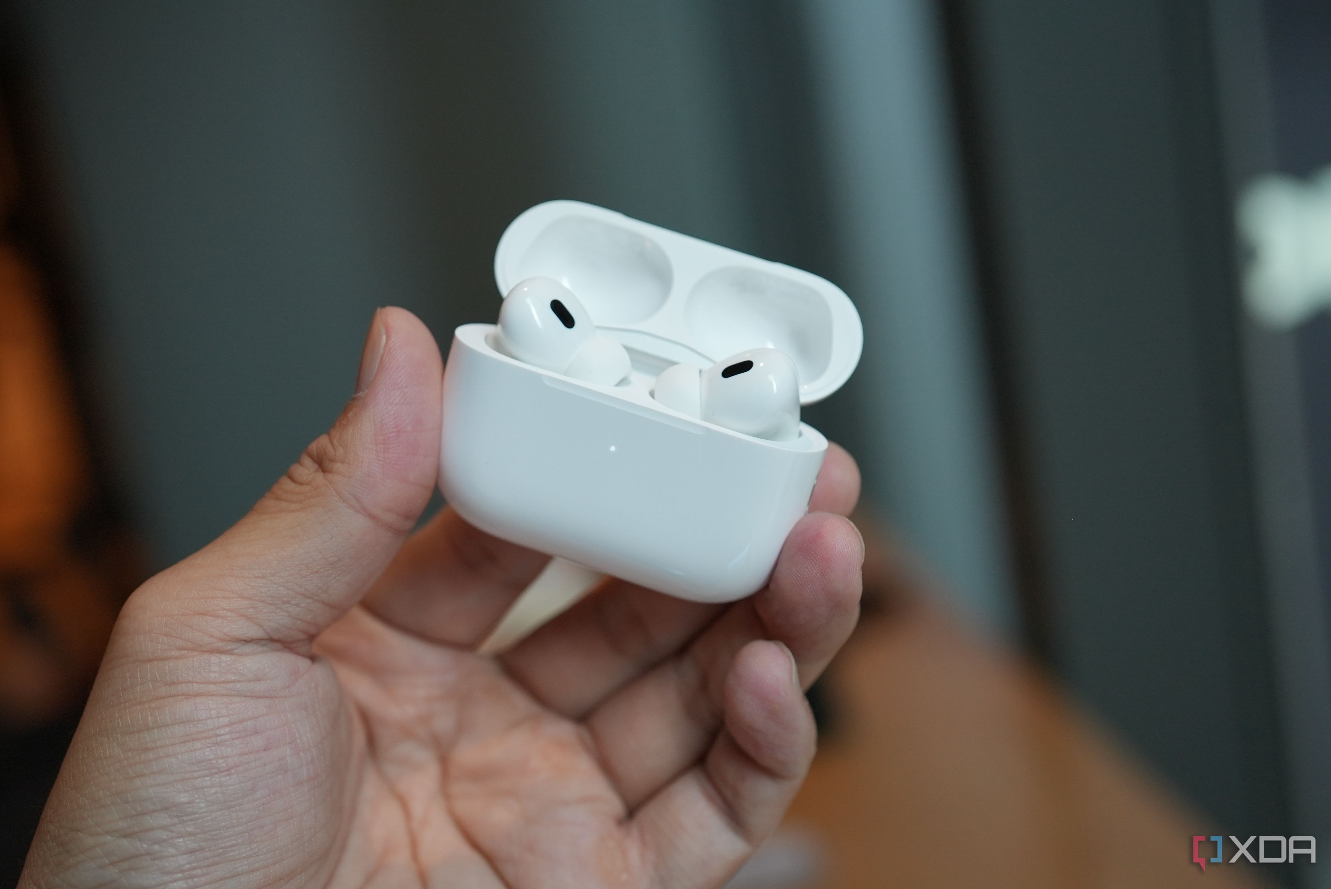Apple AirPods in their case