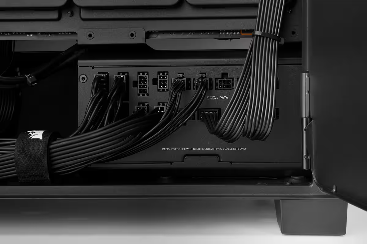 a black corsair psu backside with cable connected to it