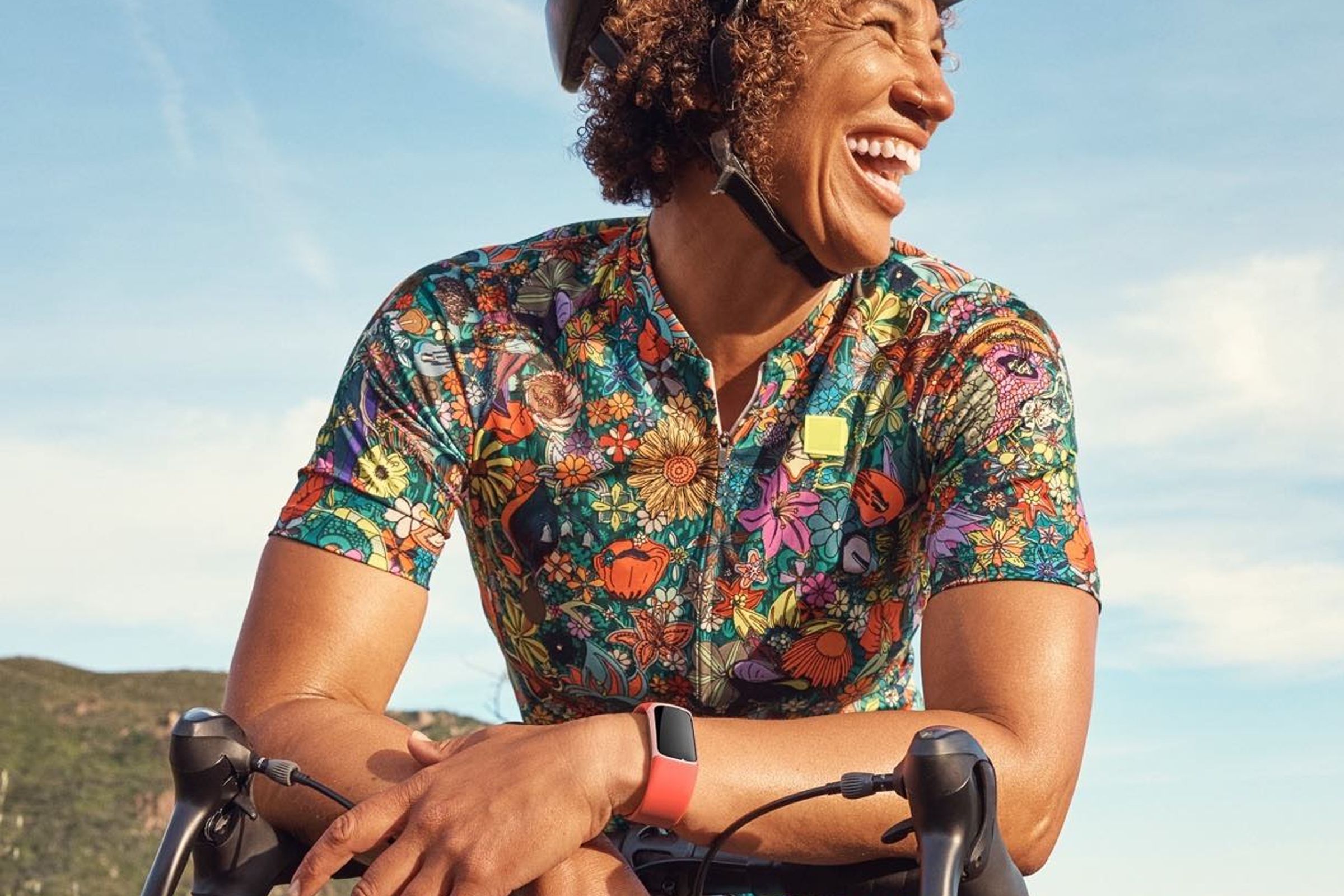 Fitbit Charge 6 lifestyle image woman cycling