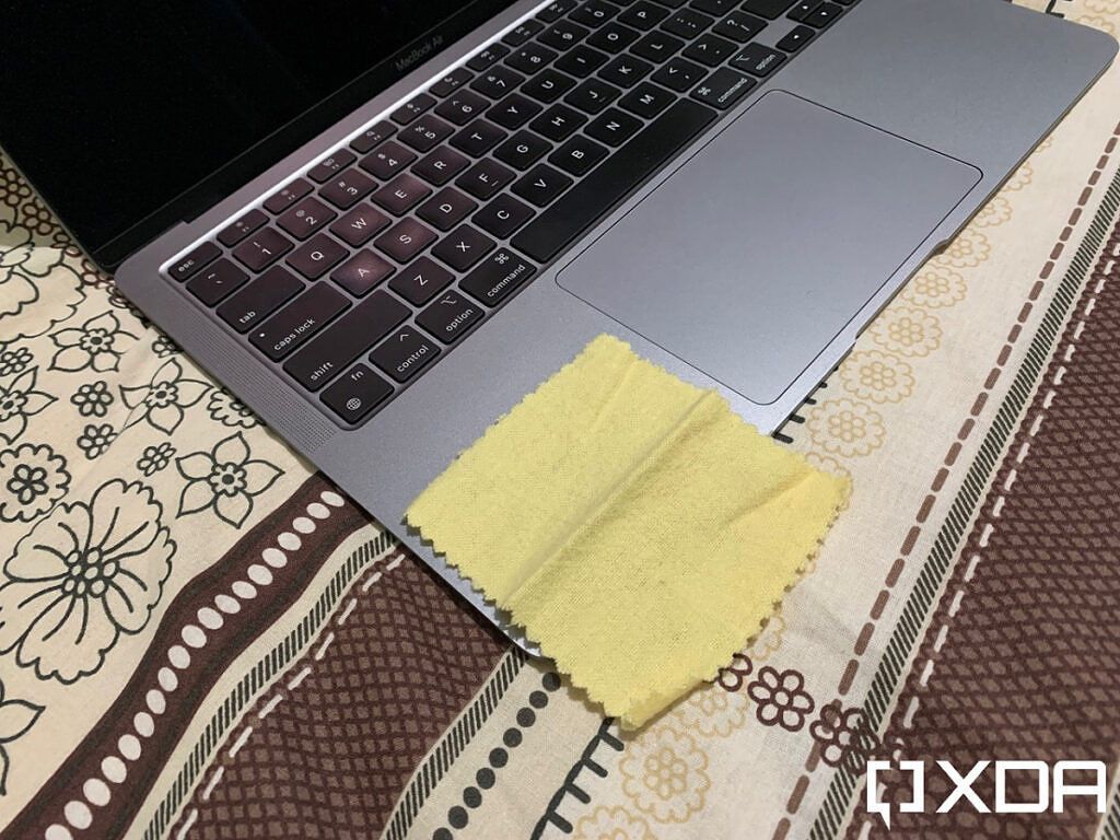Polishing cloth on a MacBook Air