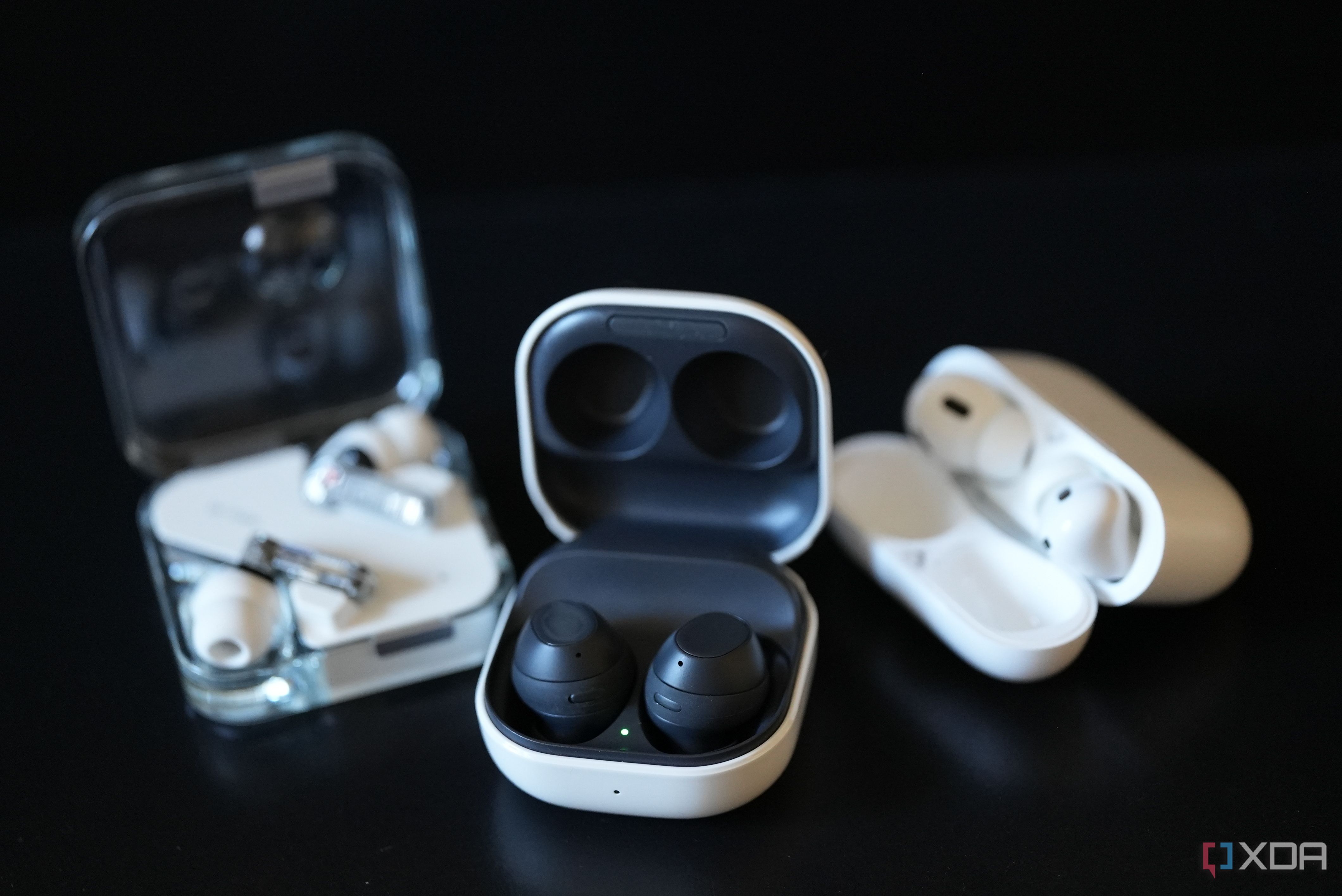 Galaxy Buds FE (middle) next to the Nothing Ear 2 (left) and Apple AirPods Pro 2 (right)