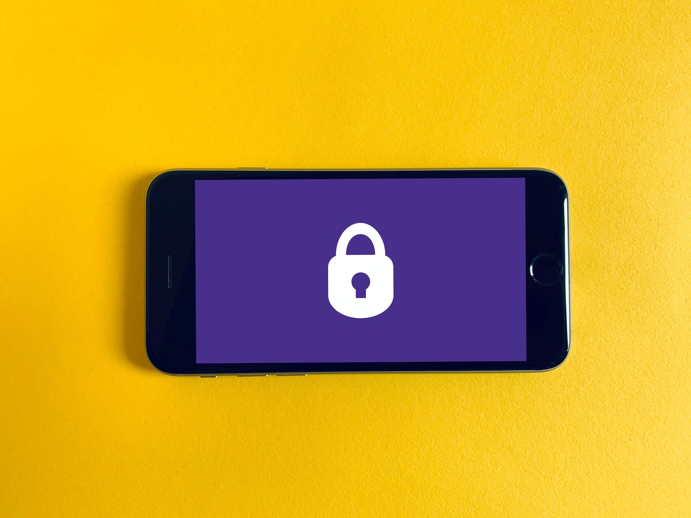 An iPhone showing an image of lock, depicting safety.