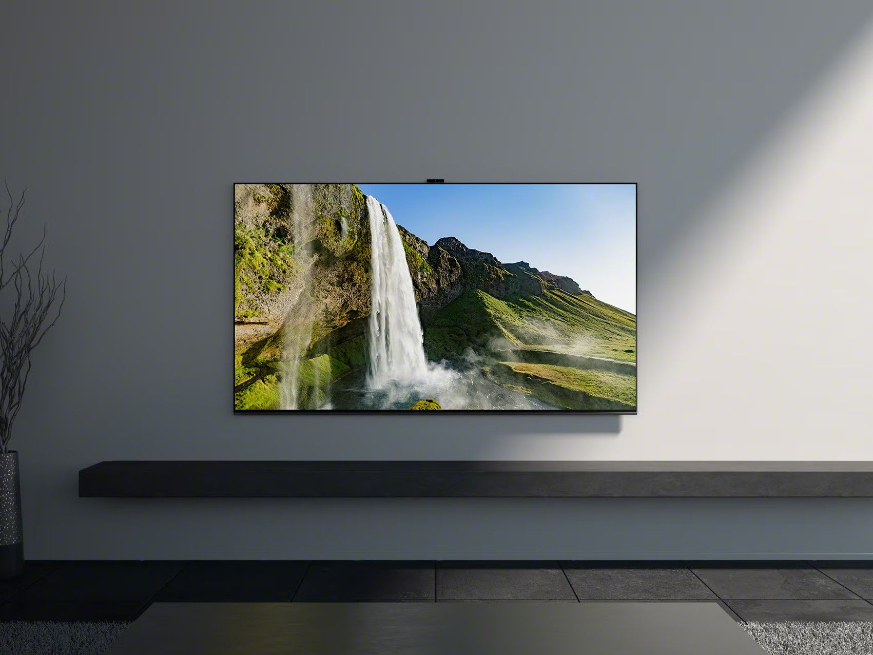 A Sony BRAVIA XR X90 mounted on a wall.
