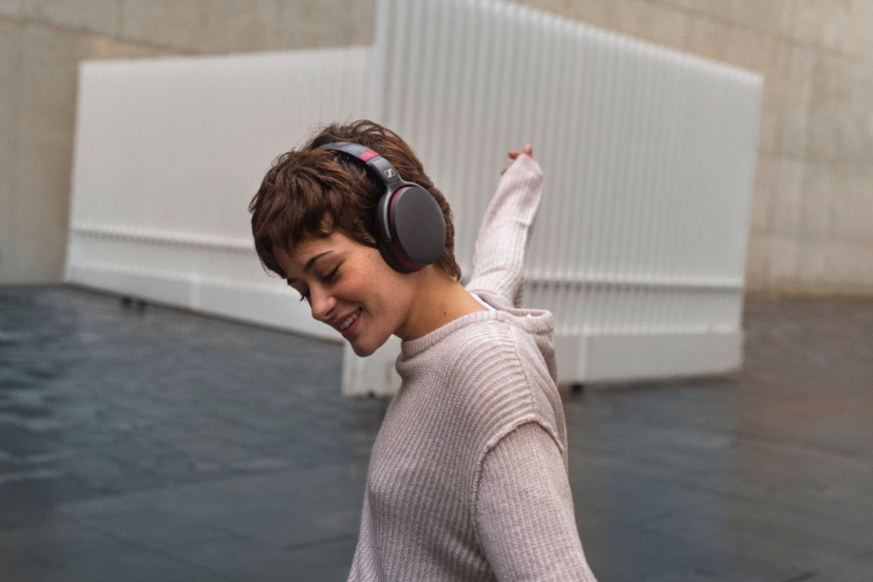 Person wearing Sennheiser HD 458BT Wireless Noise Cancelling Headphones