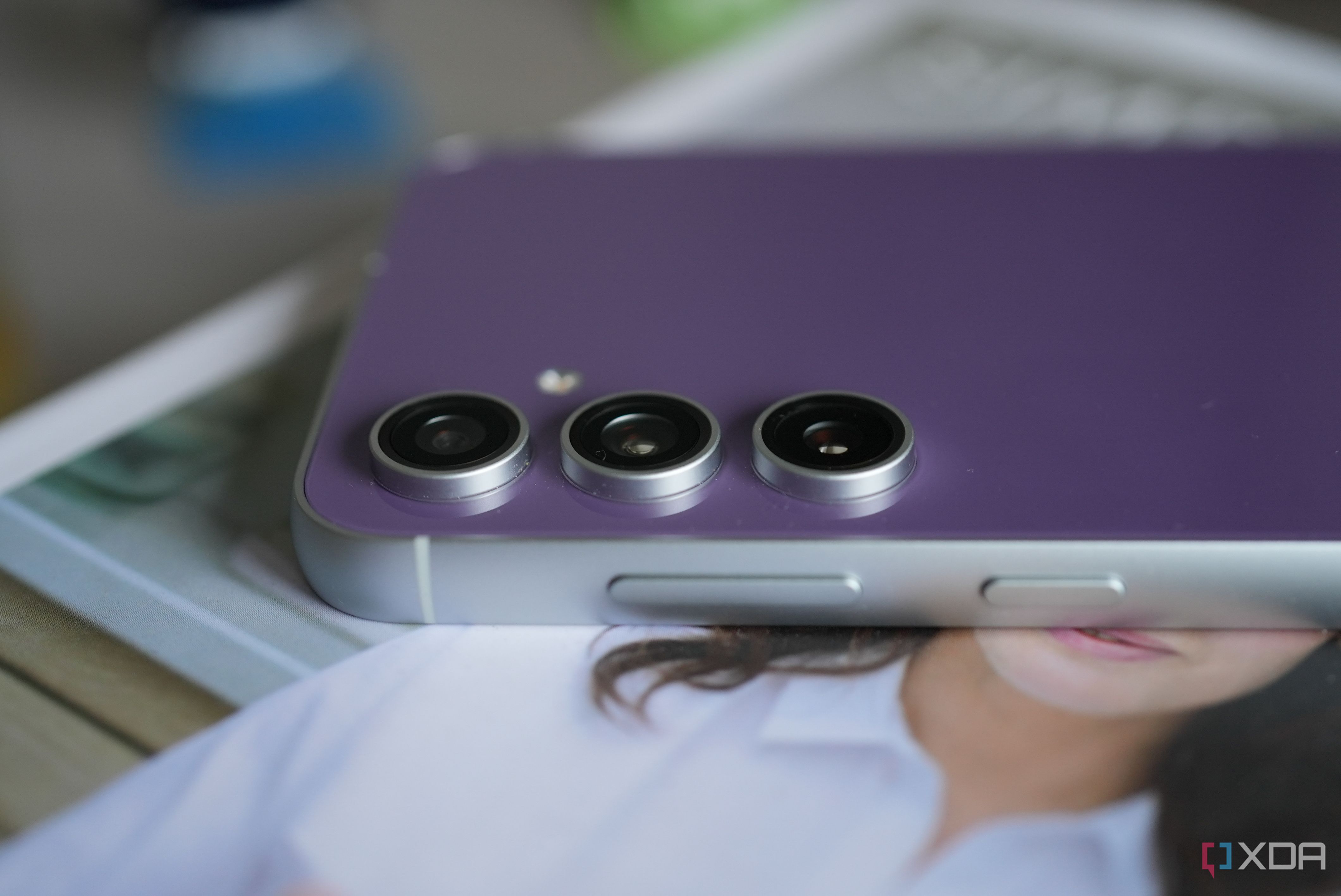 Samsung Galaxy S23 FE in purple, laying face down 