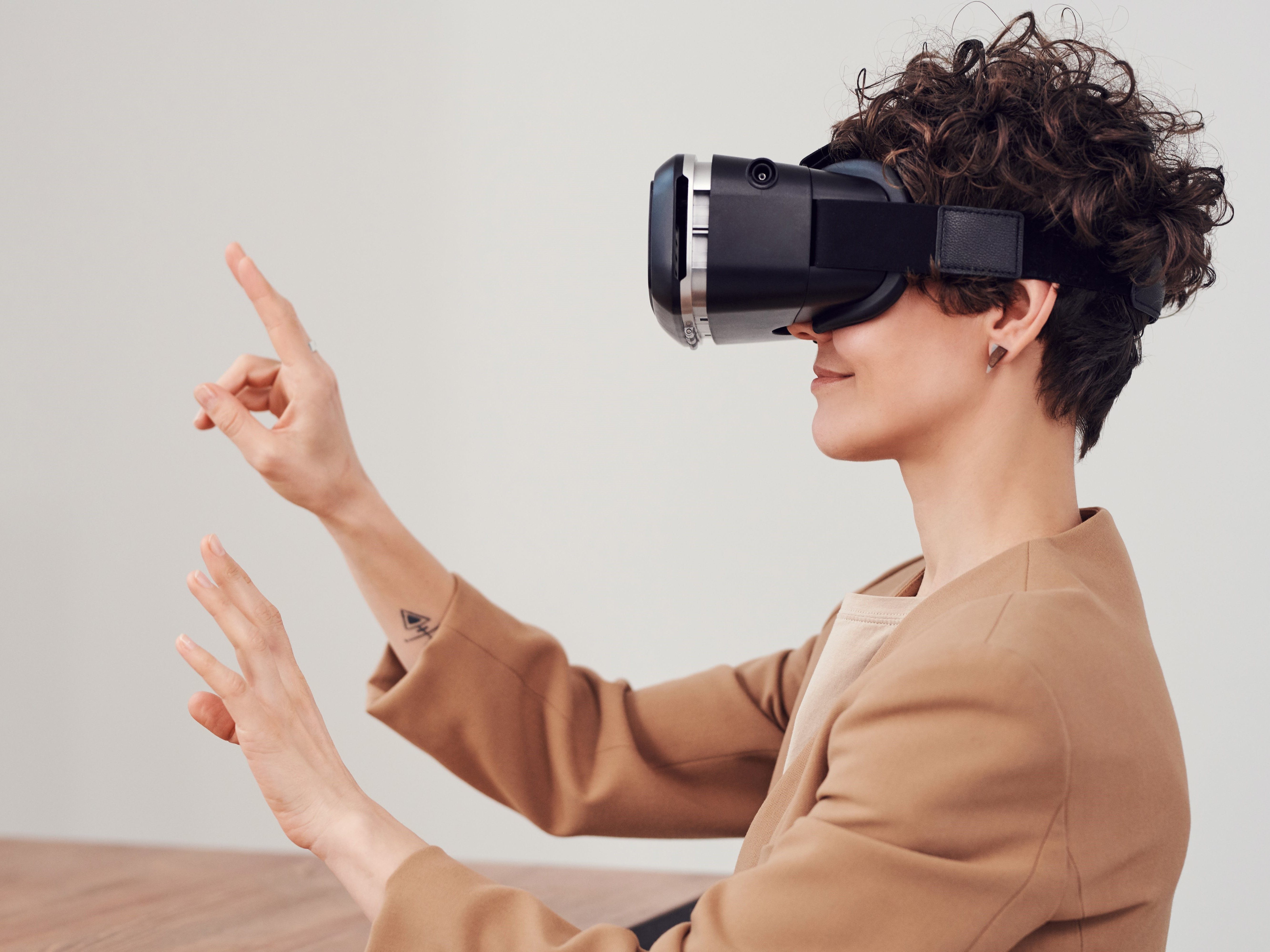 Woman using a VR headset with hand gestures