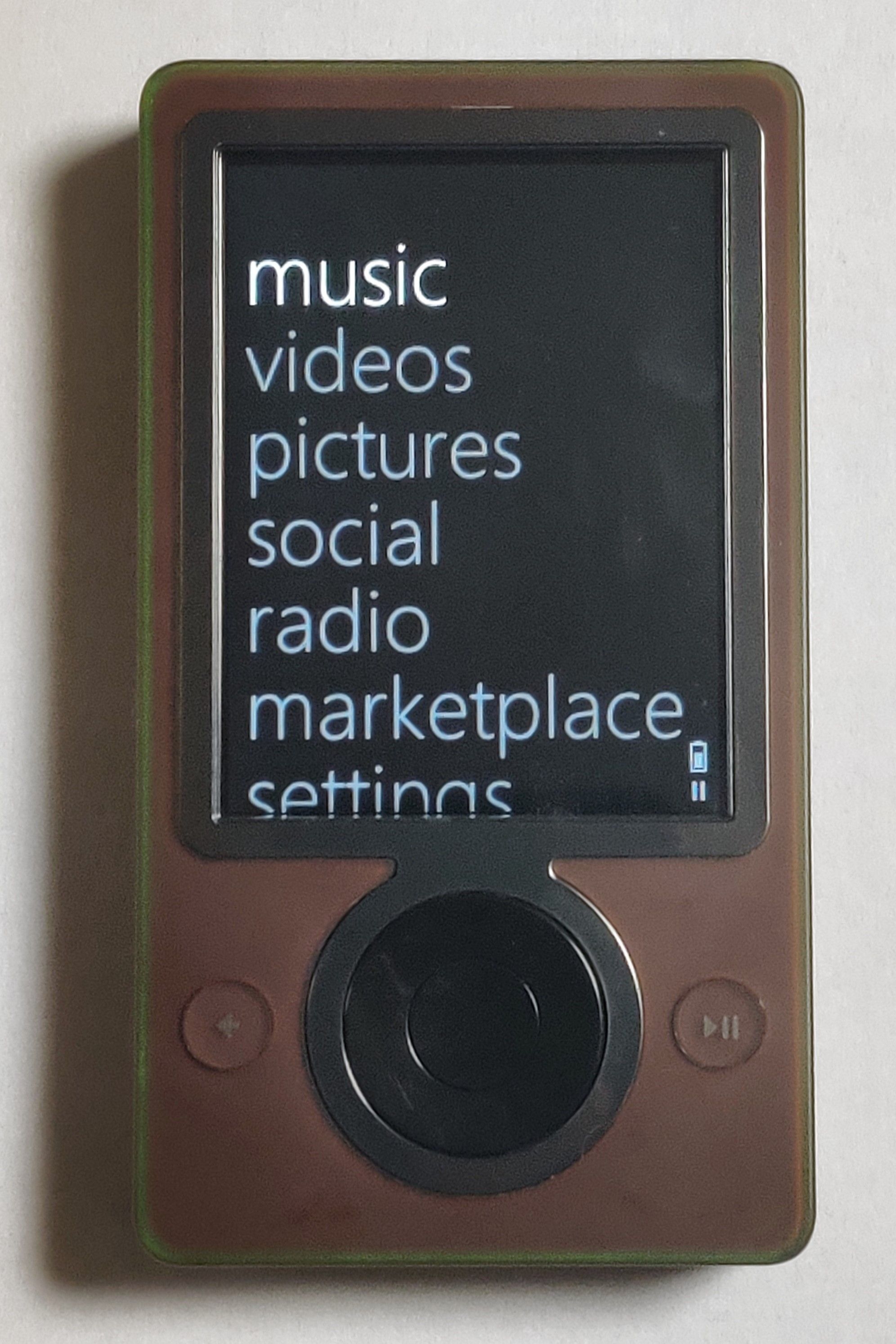 Front view of a Zune 30 in brown