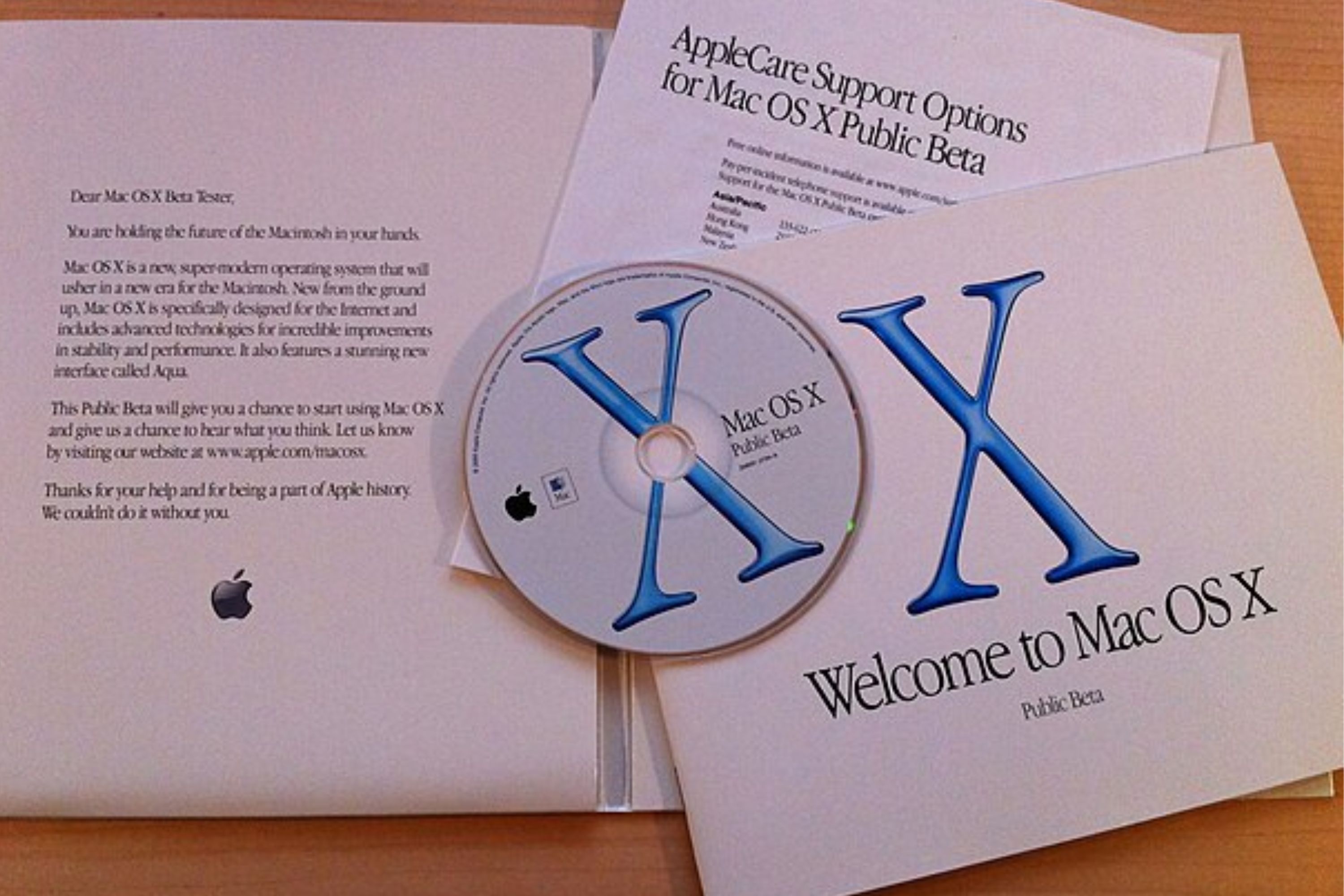The install disk and manuals for Mac OS X. 