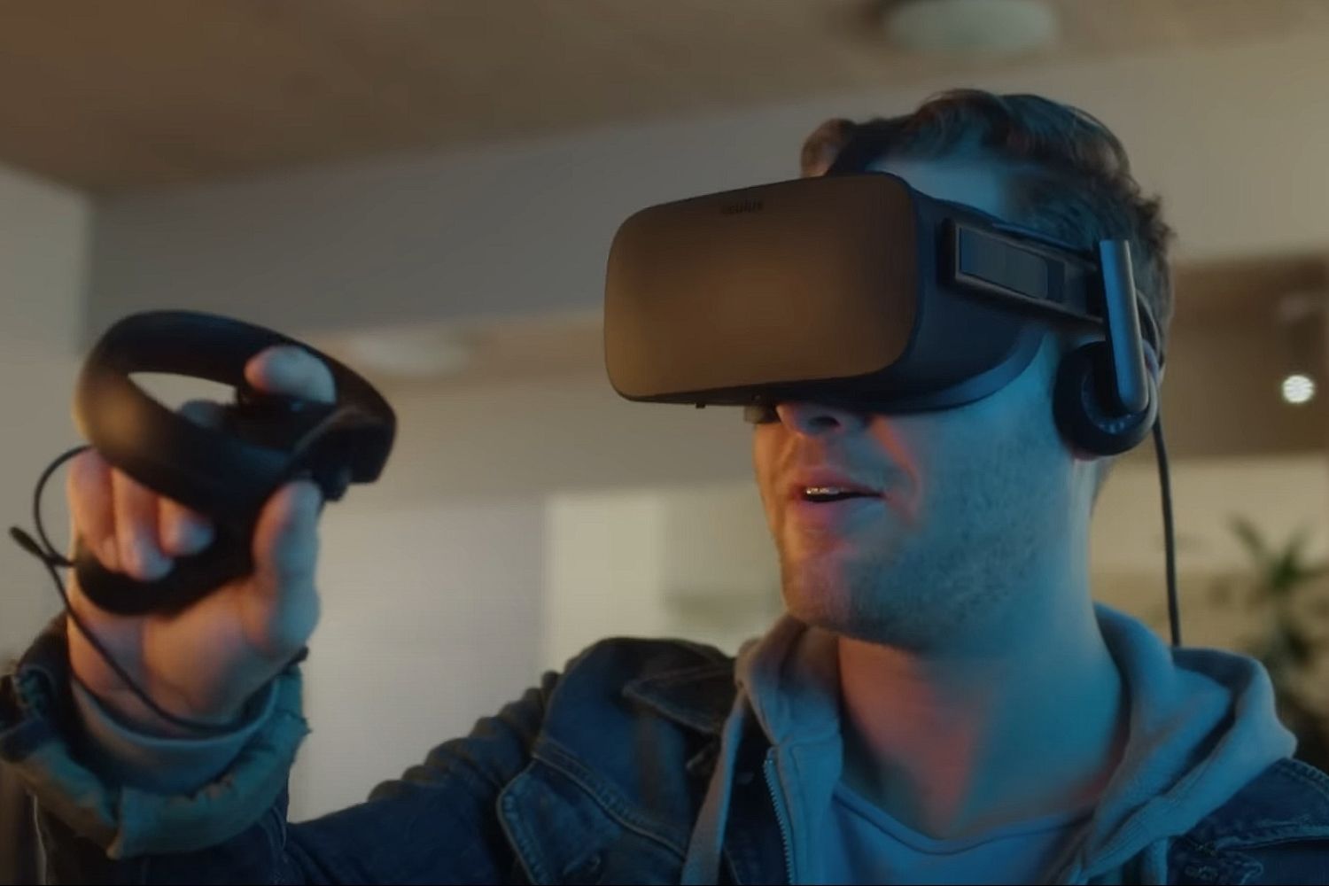 A person using the Oculus Rift CV1 headset and Oculus Touch controllers