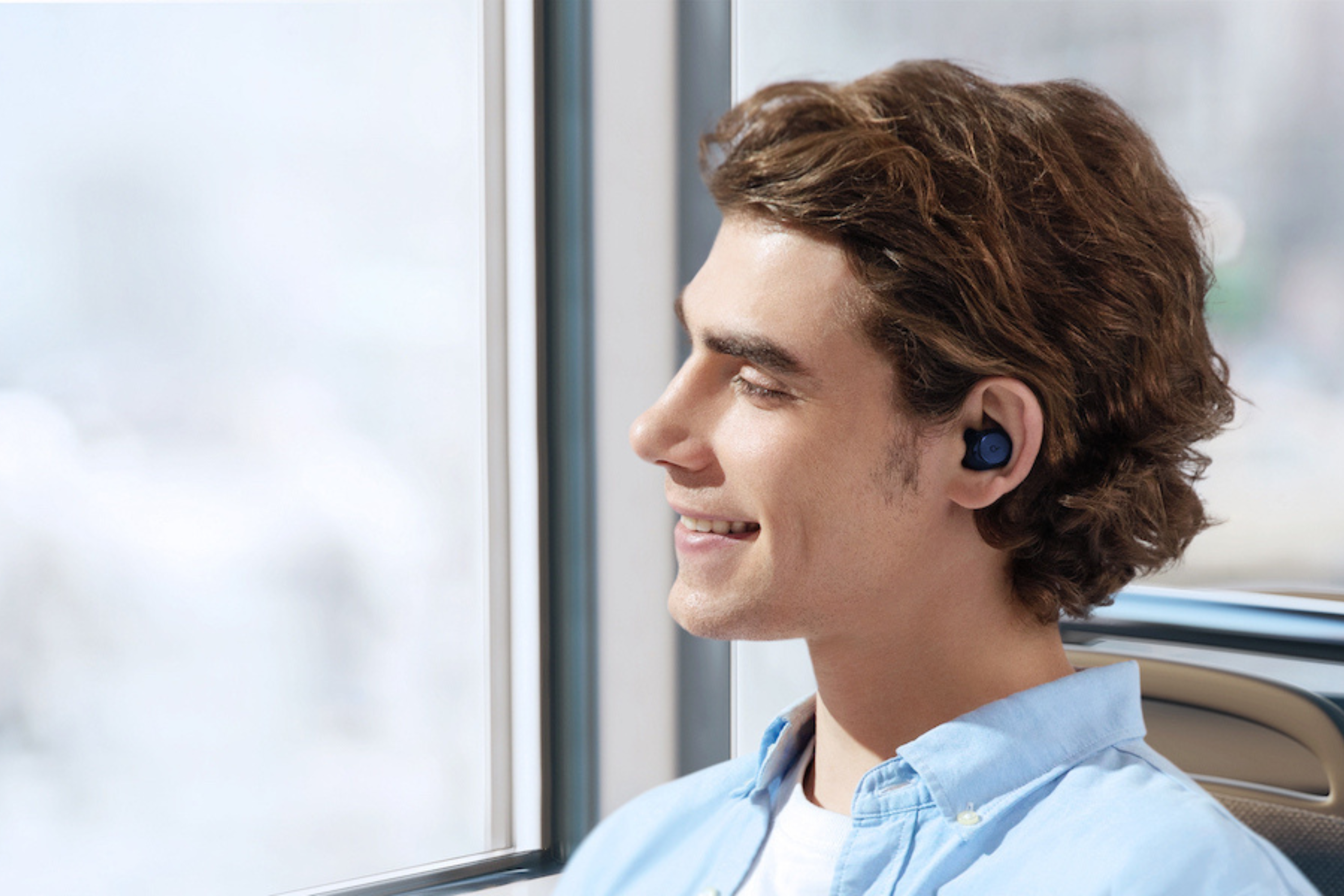  Anker Space A40 earbuds in person's ear