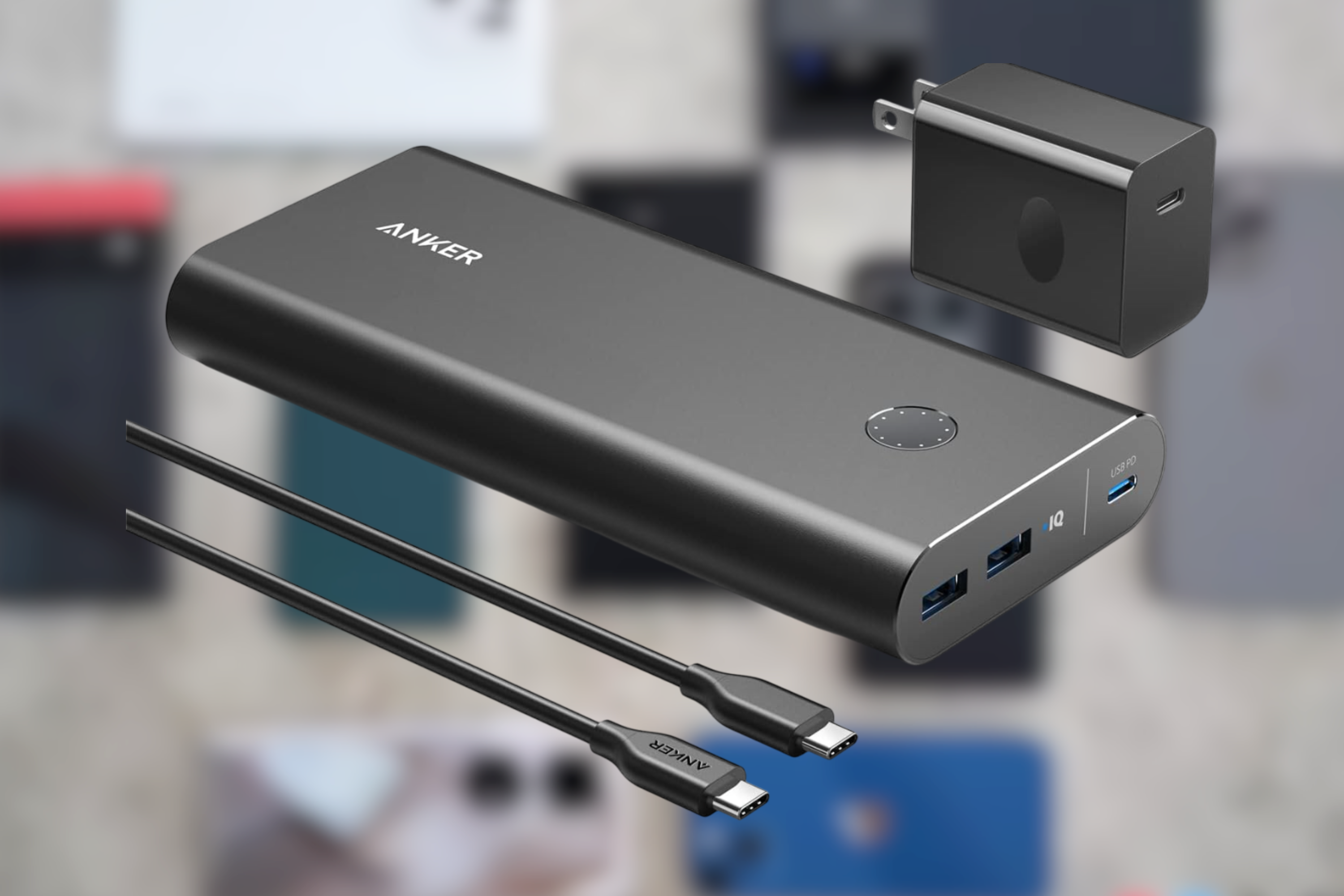Anker PowerCore bundle with blurred phones in background