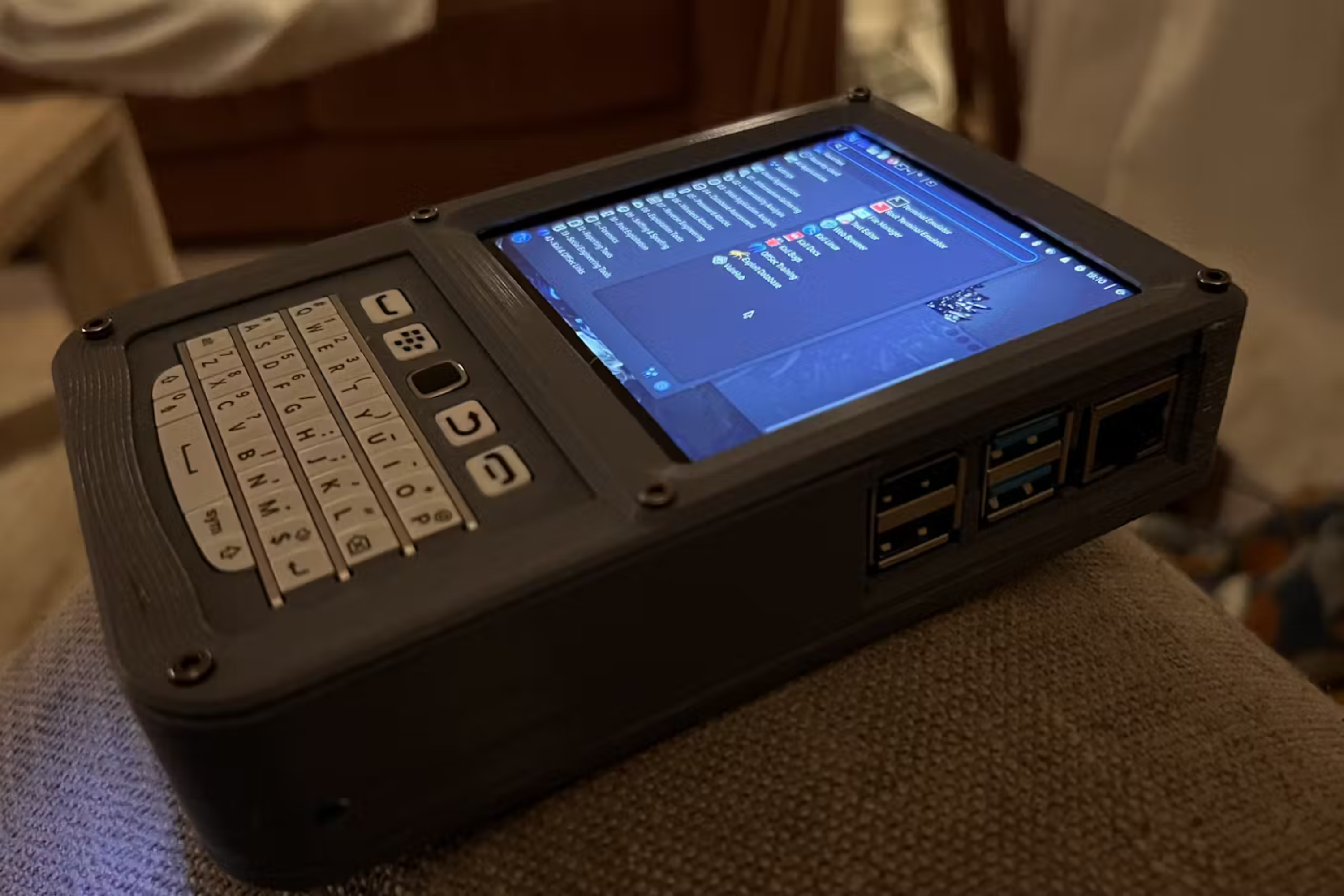 This Pi-powered pocket PC features a Blackberry keyboard and trackpad