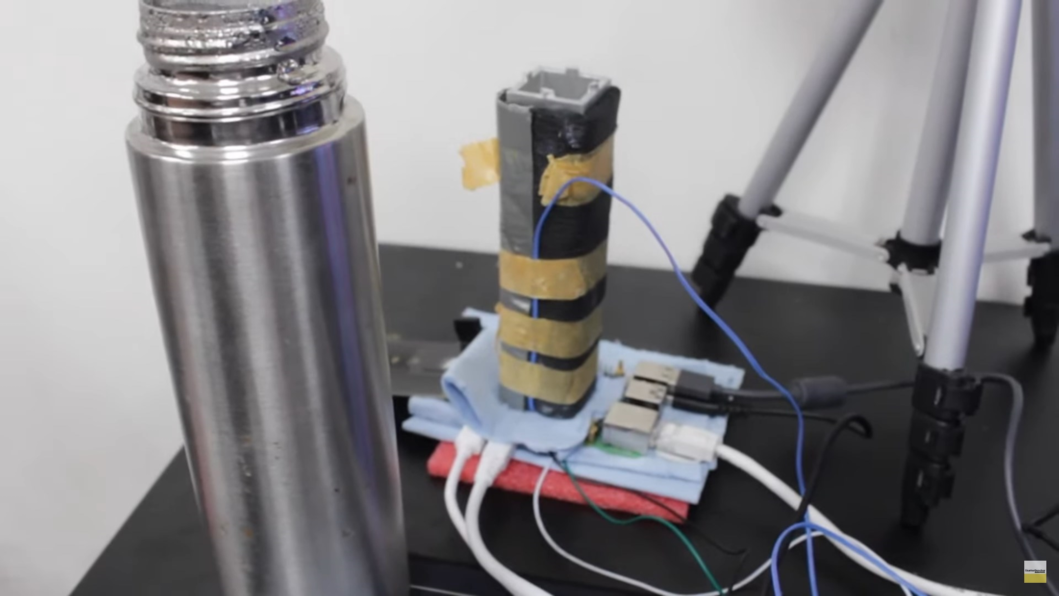 A Raspberry Pi 5 being cooled by liquid nitrogen