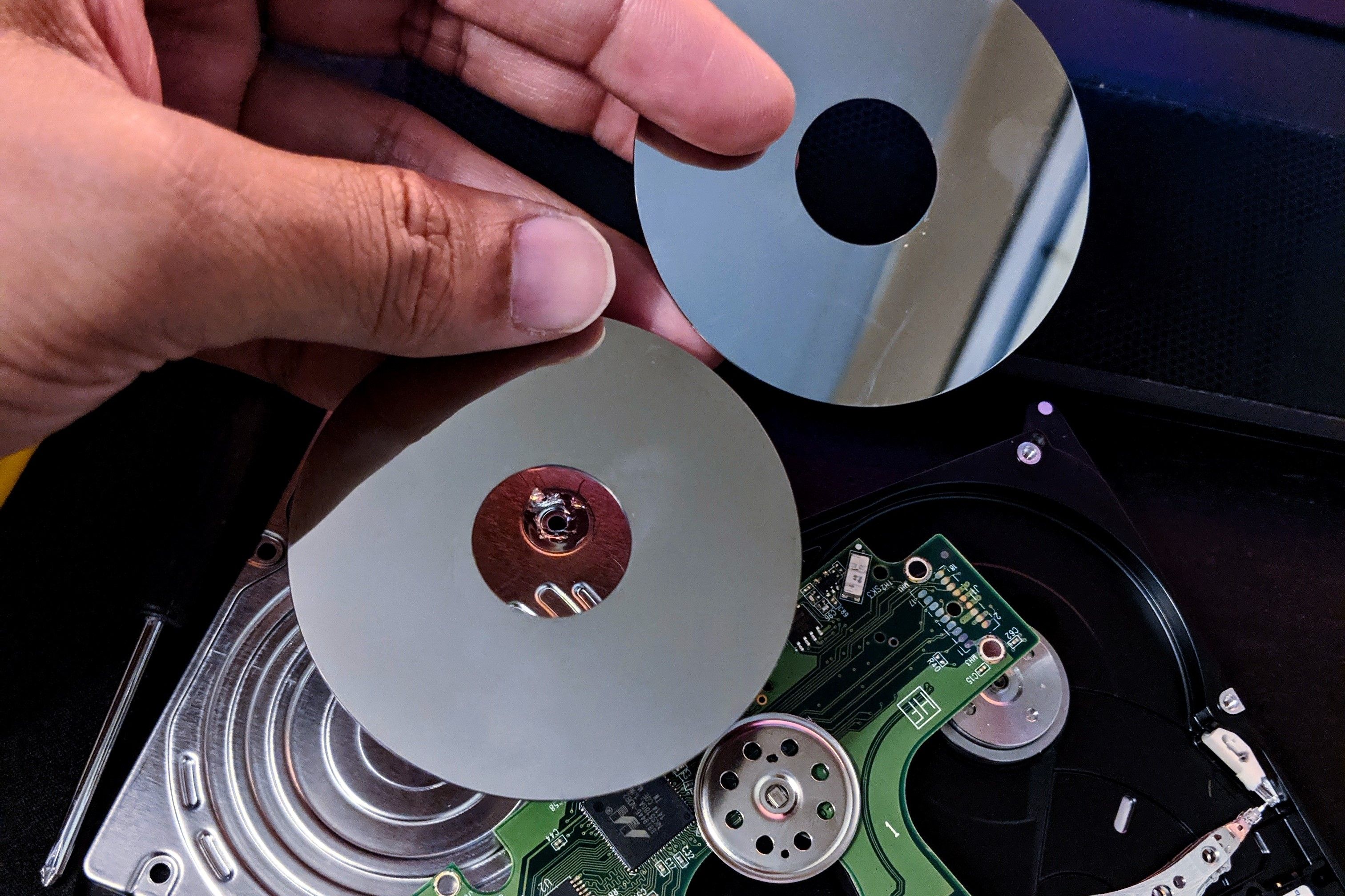 Hard drive platters removed from a laptop hard drive