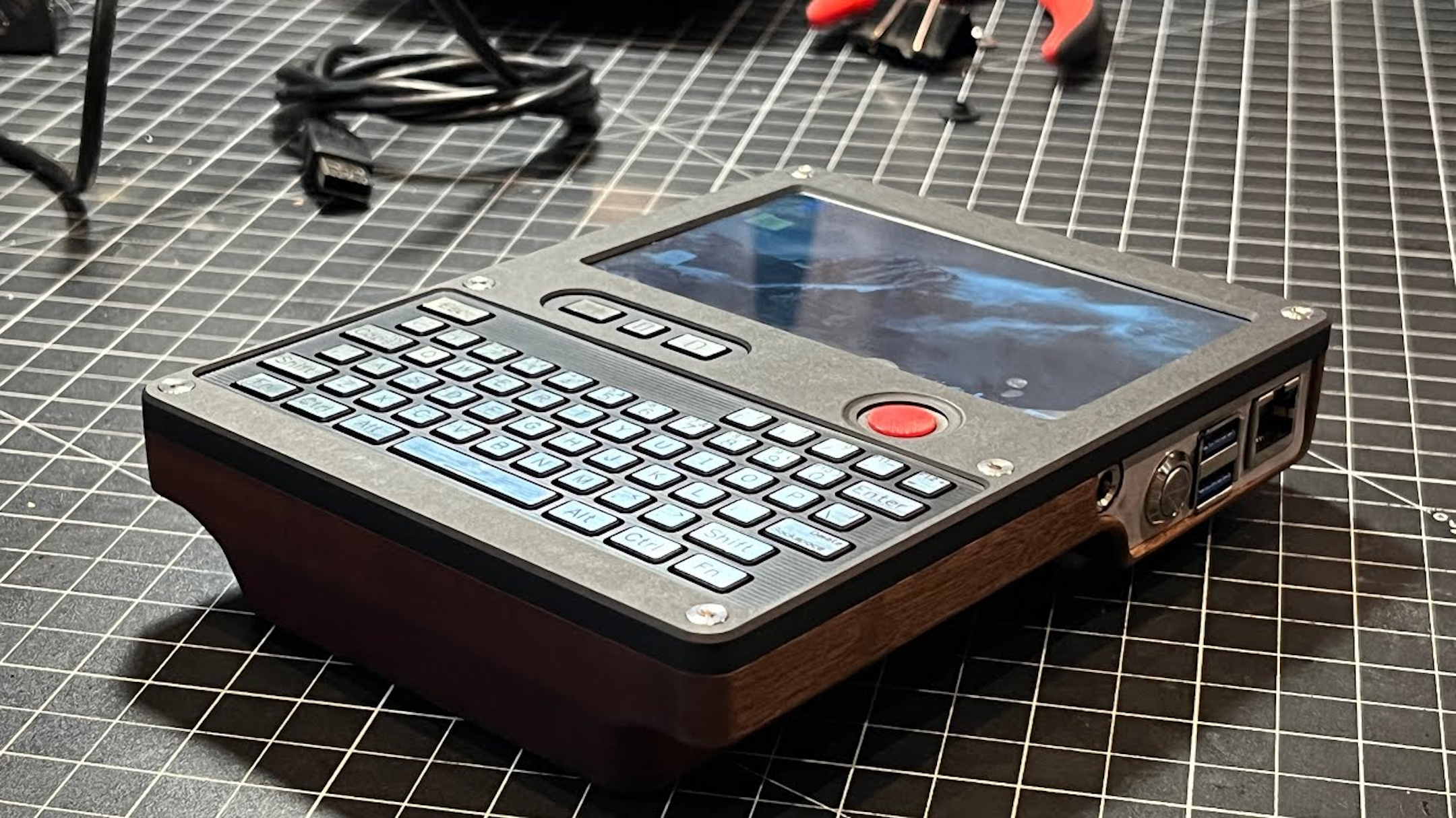 This classy Raspberry Pi cyberdeck uses a hardwood case, and I'm really jealous