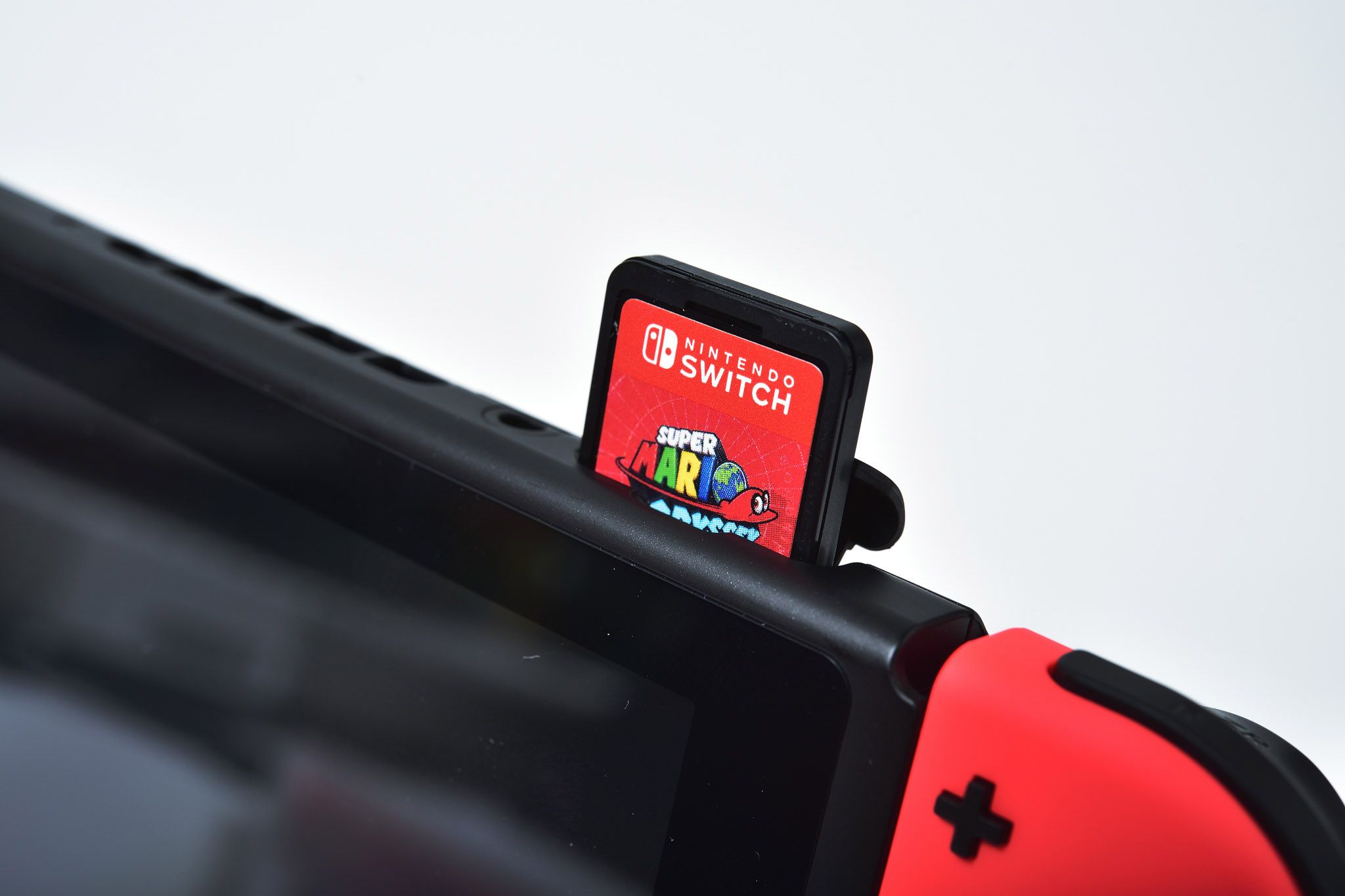 Nintendo Switch game console with a game card in the slot
