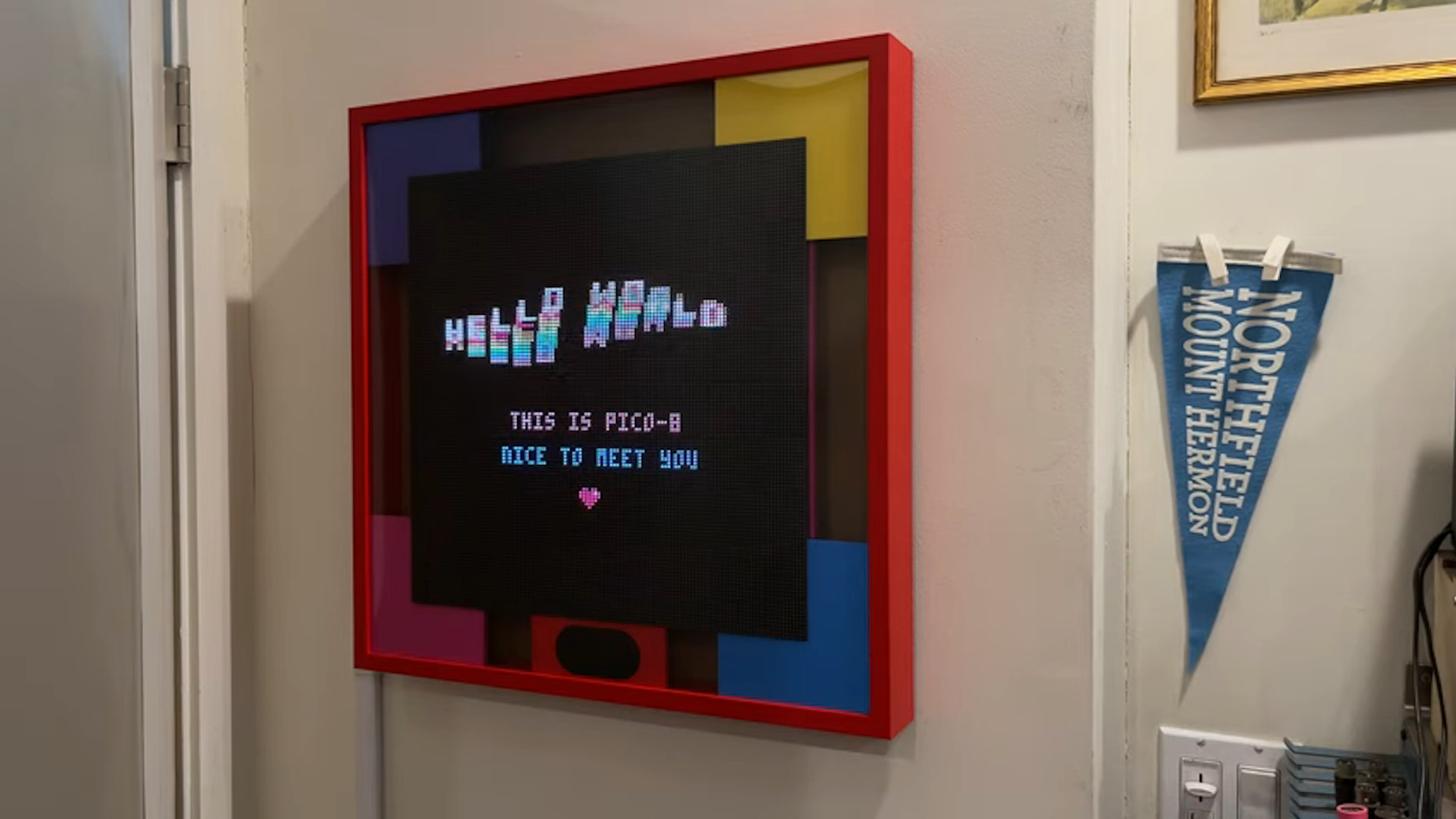 This cool Raspberry Pi Pico-8 wall arcade is like a painting you can play