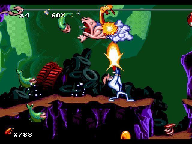 Earthworm Jim firing a gun at an enemy