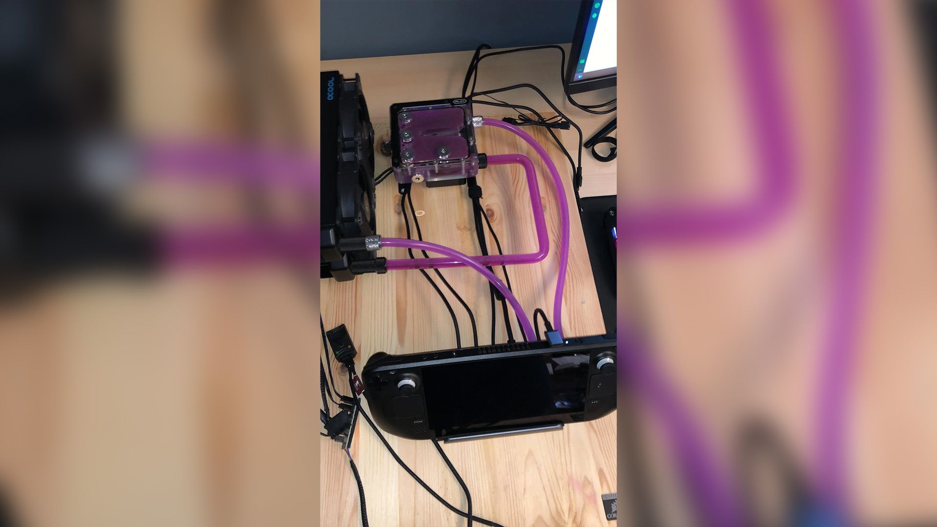 Someone built a custom liquid cooling loop for their Steam Deck because why not?