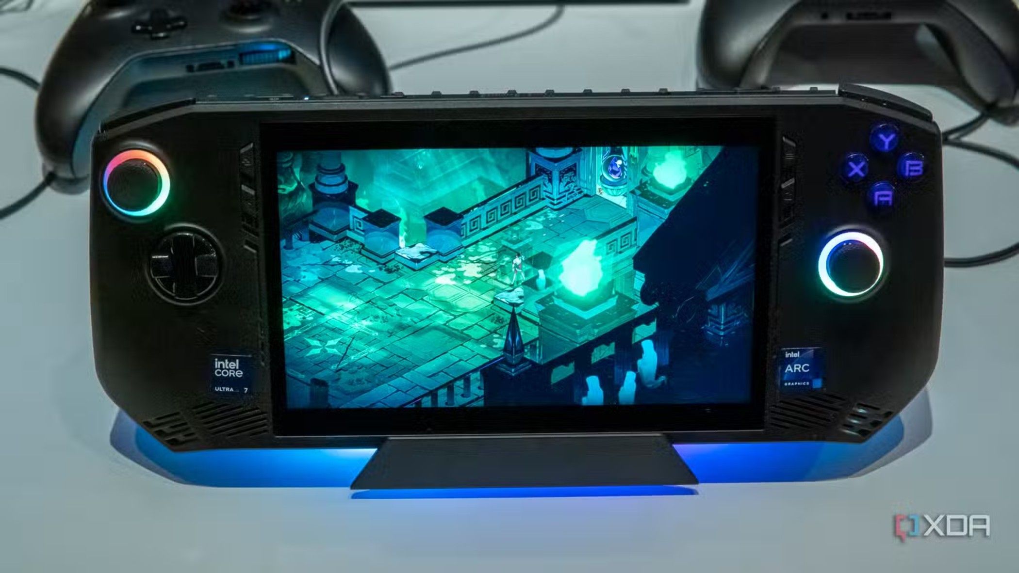 MSI Claw 7 handheld gaming PC, docked on a white table.