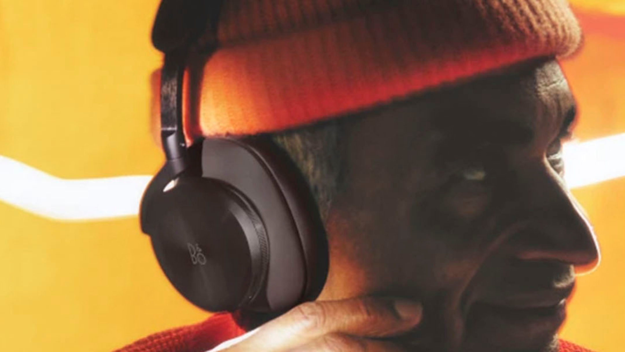 Person wearing Bang & Olufsen Beoplay H95 Premium Comfortable Wireless Active Noise Cancelling (ANC) Over-Ear Headphones