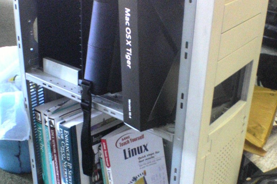 An old PC case used to store books