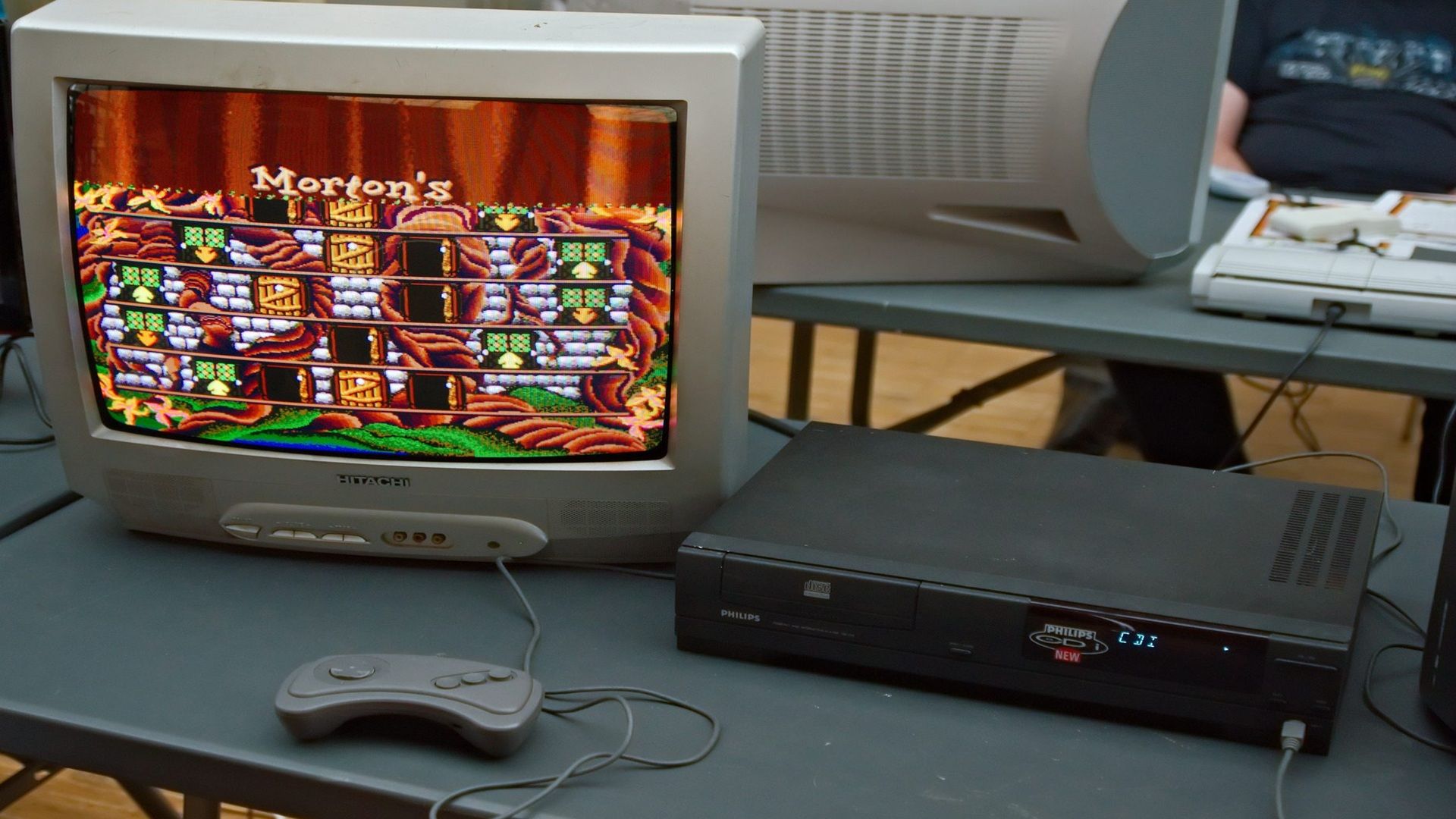 A picture of a Philips CD-i running Hotel Mario at an event