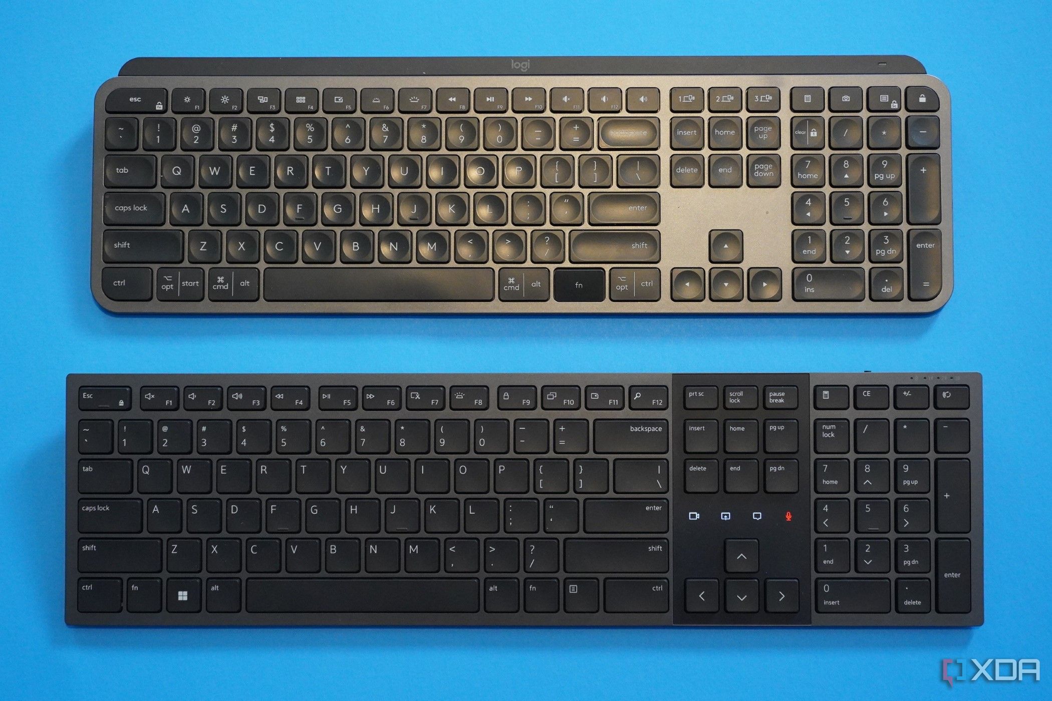 Dell Premier Collaboration Keyboard on a desk with Logitech MX Keys
