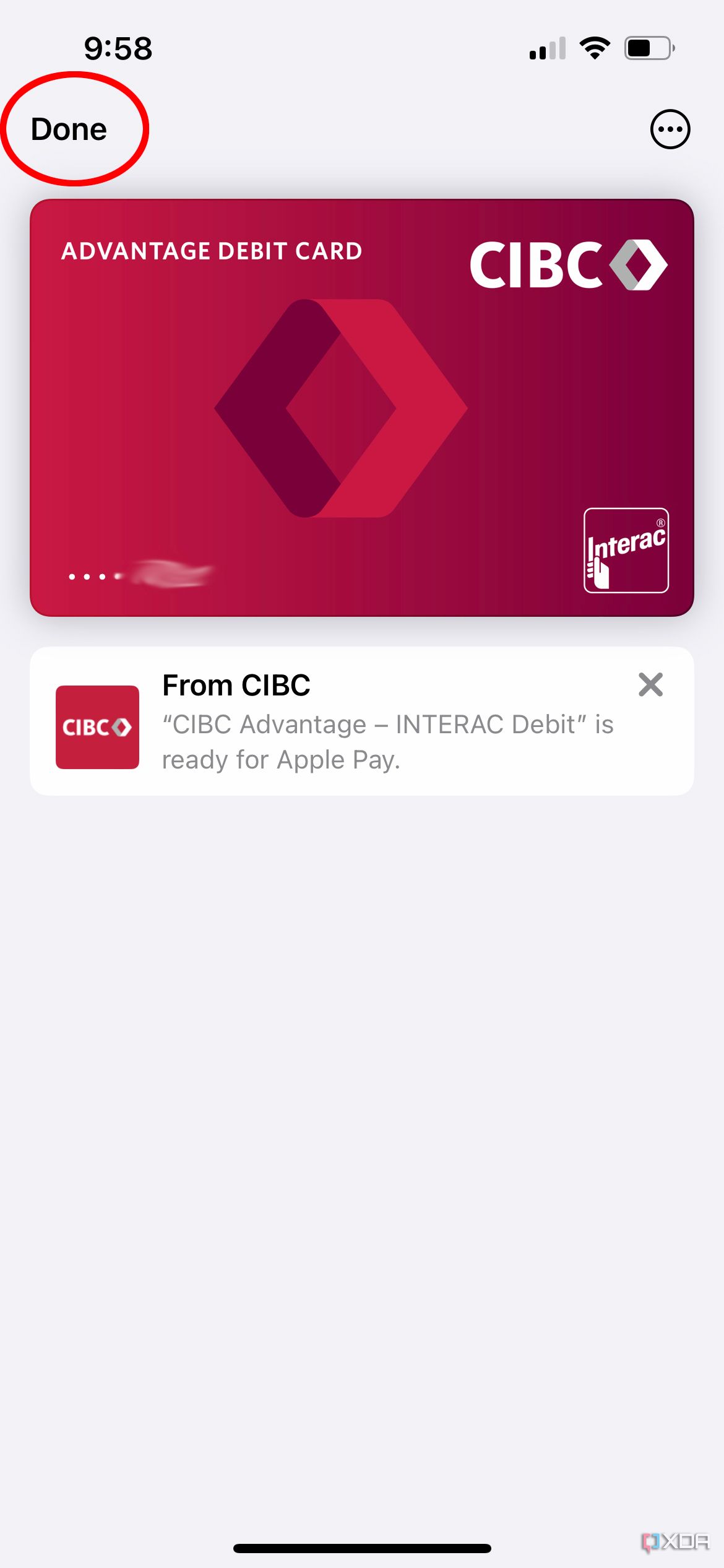 A CIBC debit card shown in Apple Wallet with the Done button highlighted.