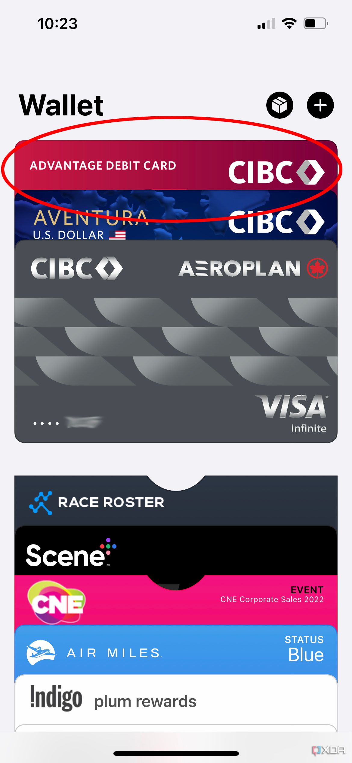A list of cards in Apple Wallet with the newly added CIBC card highlighted.