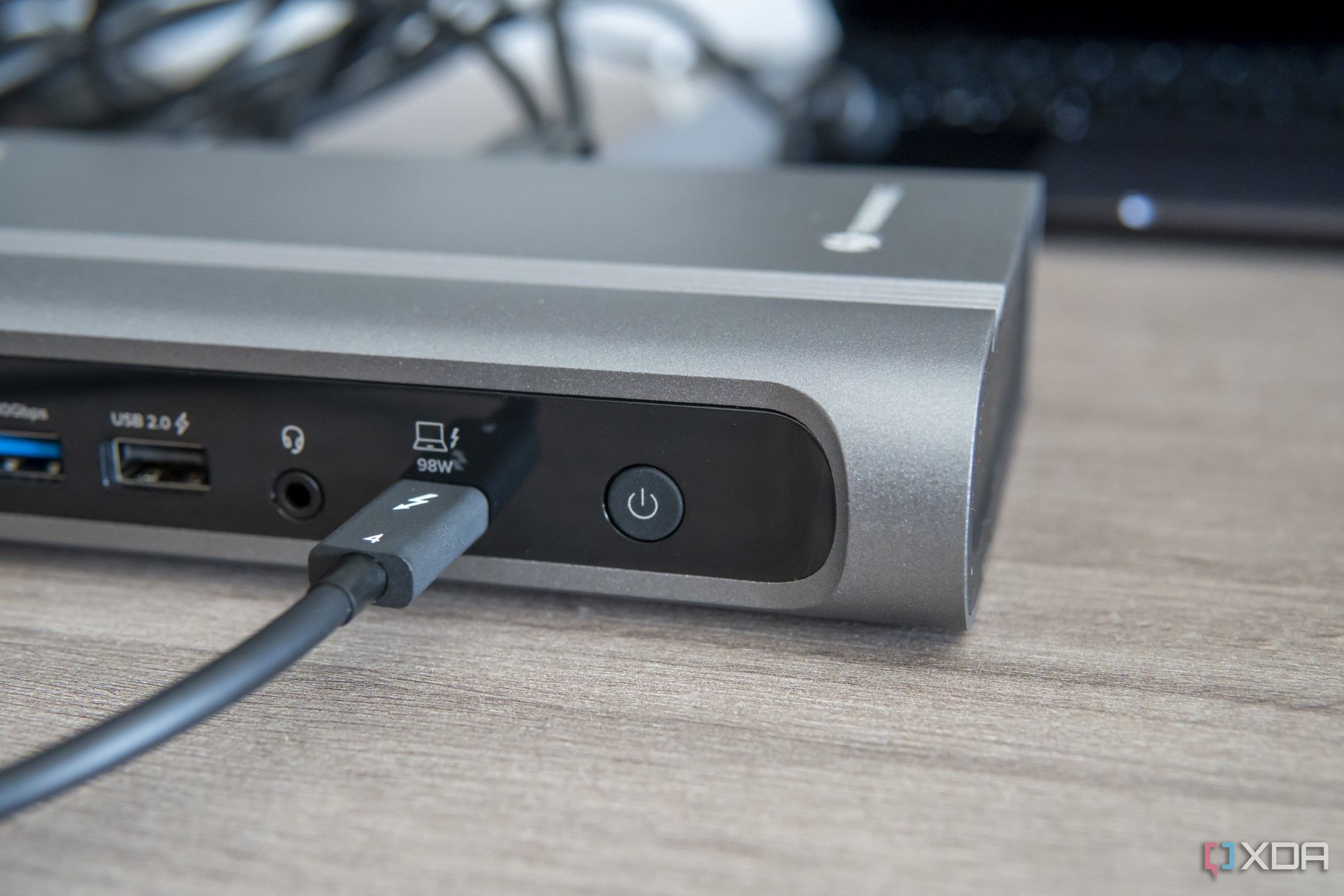 Close-up view of the power button on the Plugable 16-in-1 Thunderbolt 4 Dock 
