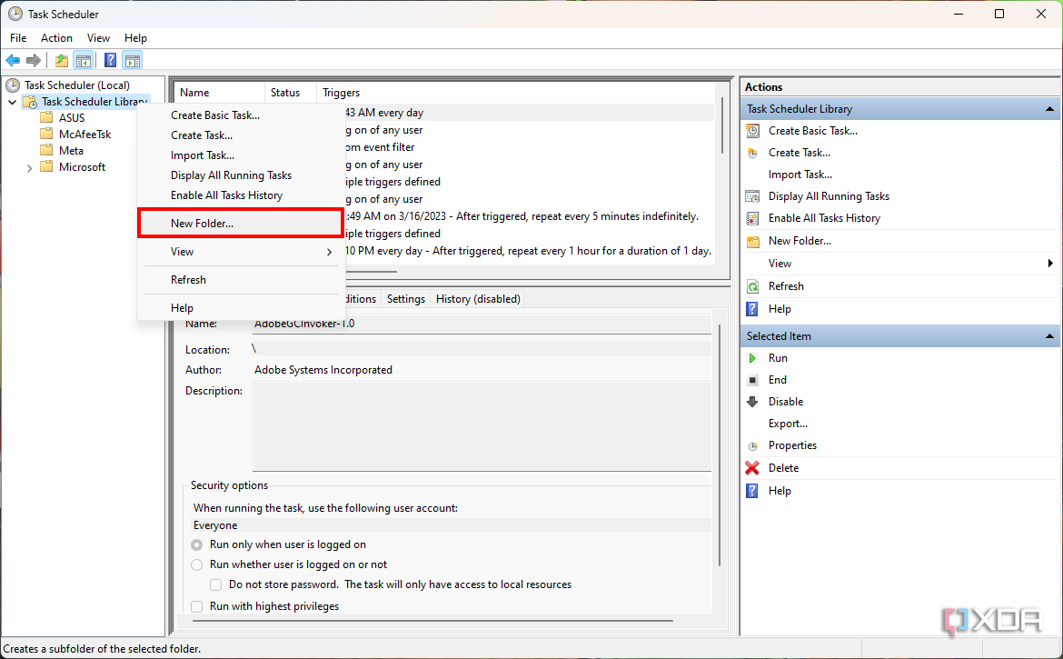 Screenshot of the Task Scheduler on Windows 11 with the option to create a new folder highlighted