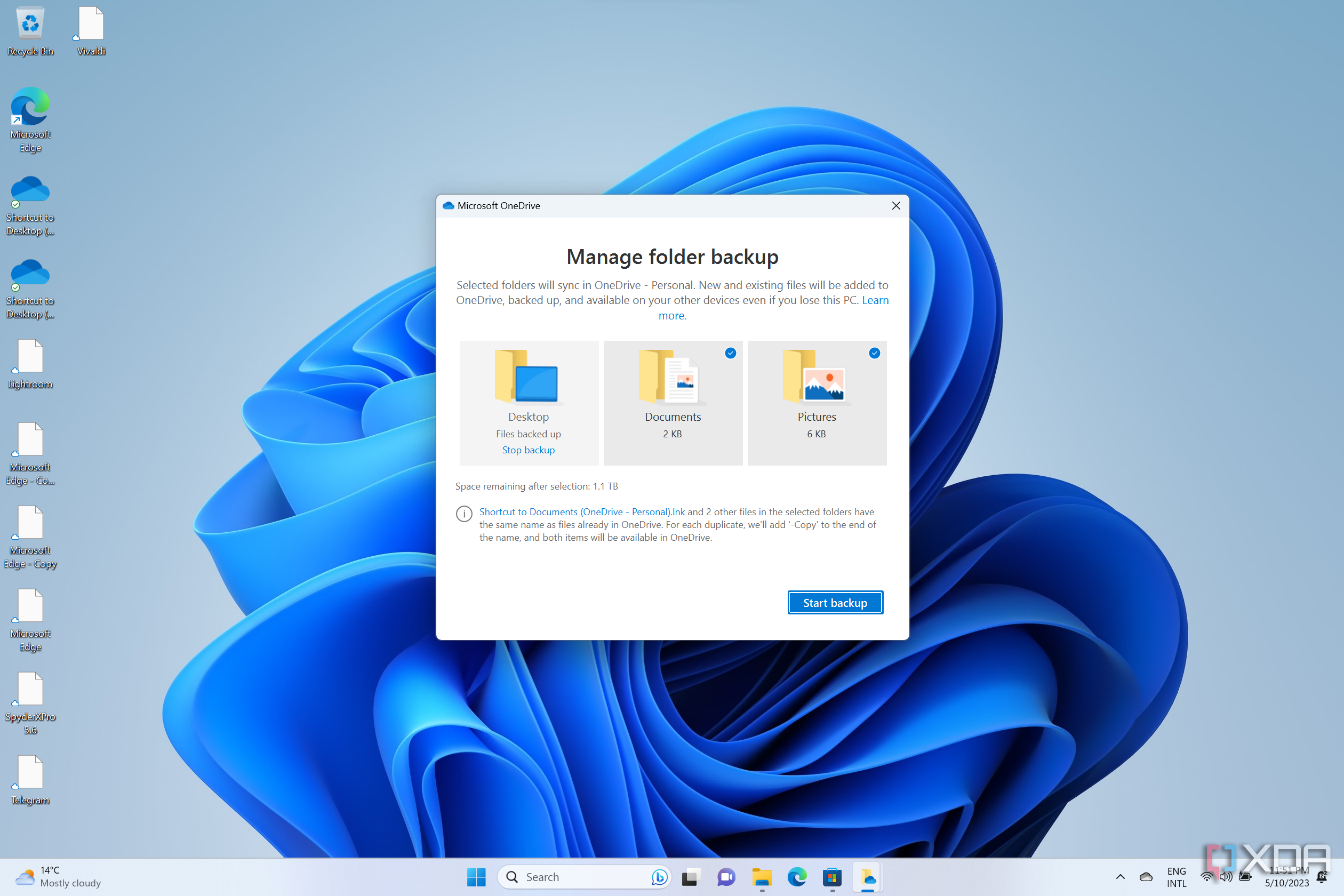 Screenshot of a Windows 11 desktop with the OneDrive folder backup settings page open