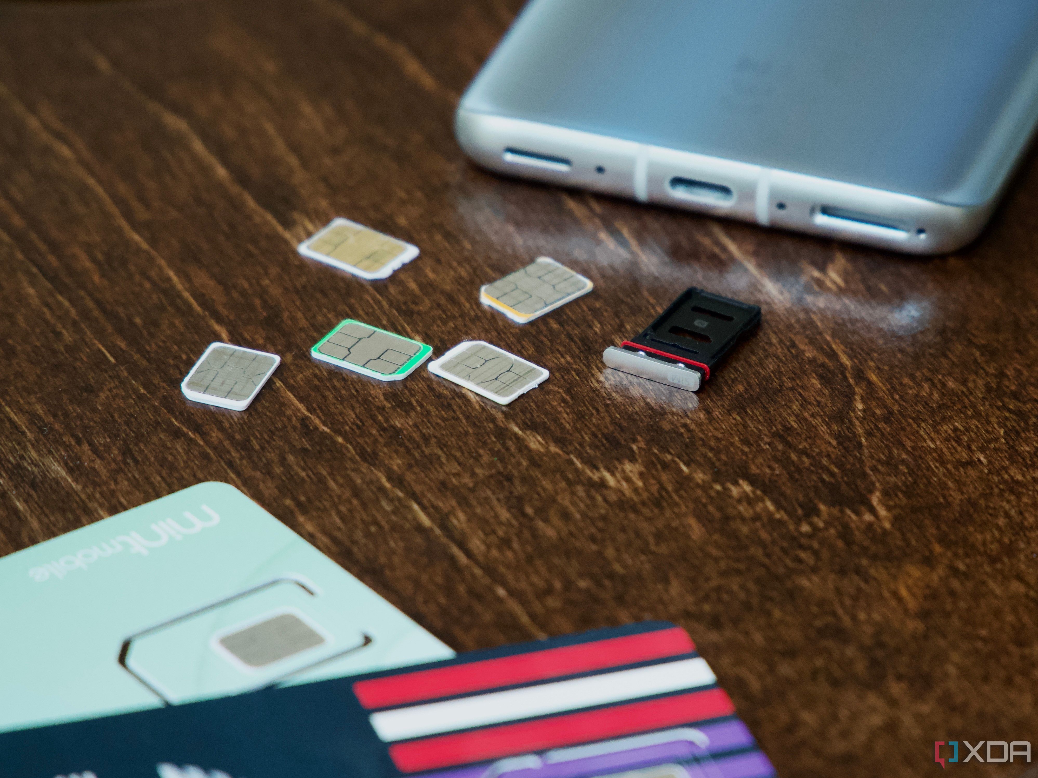 SIM cards and an ejected SIM tray