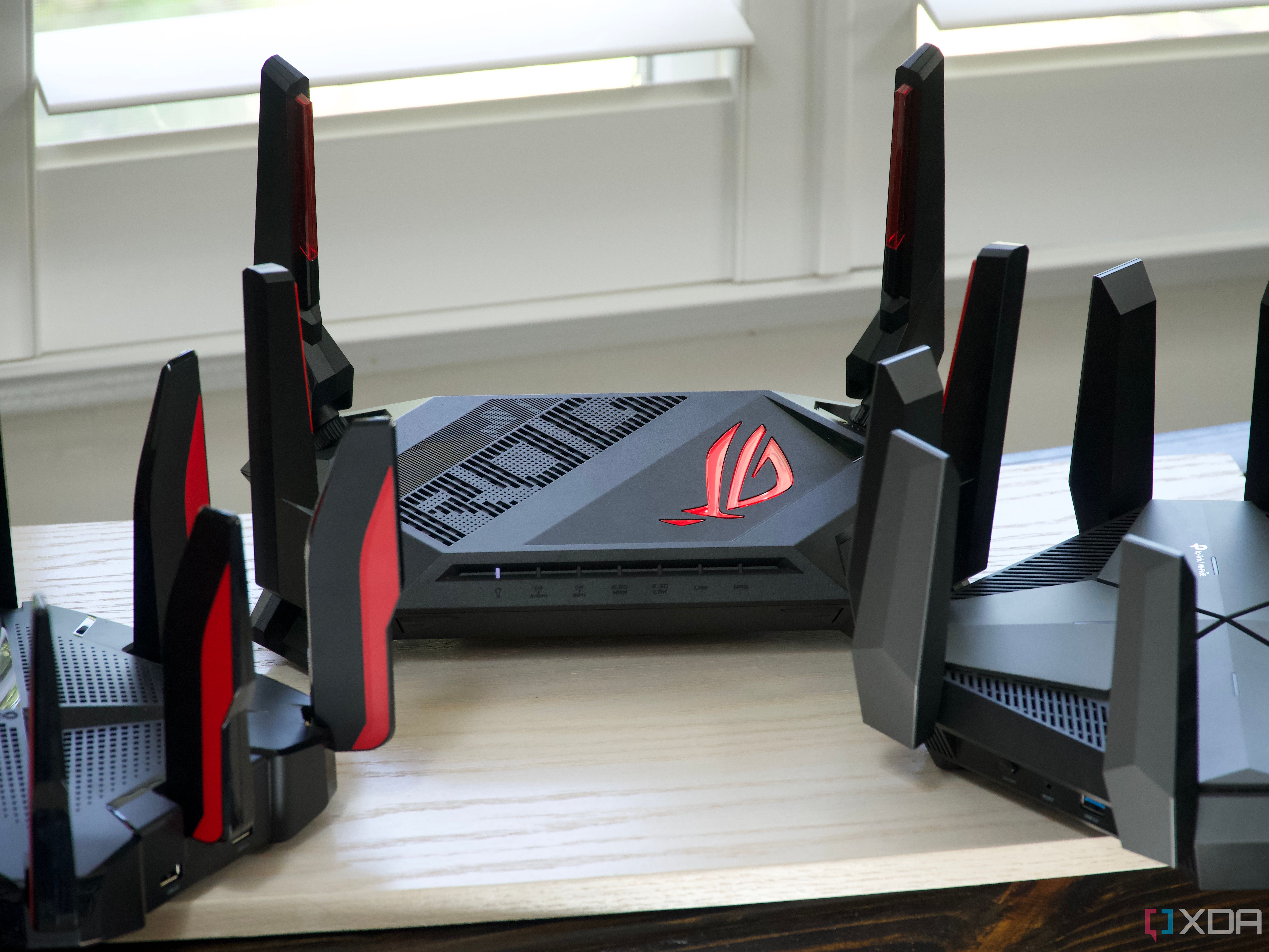 ASUS ROG Rapture GT-AX6000, TP-Link Archer GX90, and TP-Link Archer AXE300