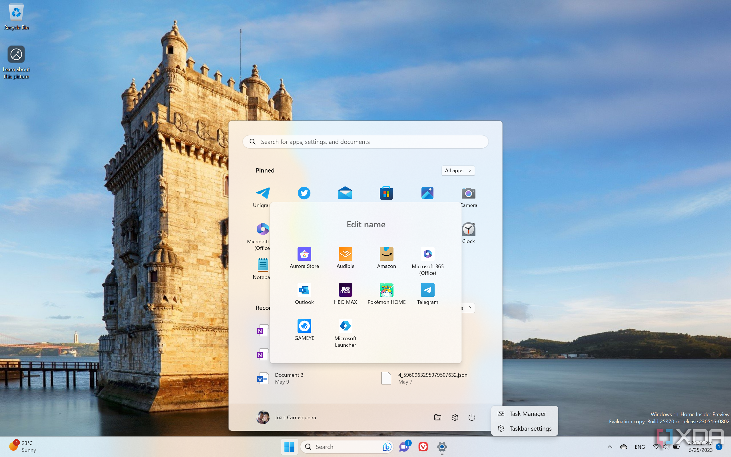 Screenshot of a Windows 11 desktop showcasing features that were brought back form previous releases, including Start menu folders, seconds on the taskbar clock, and a Task Manager button on the taskbar