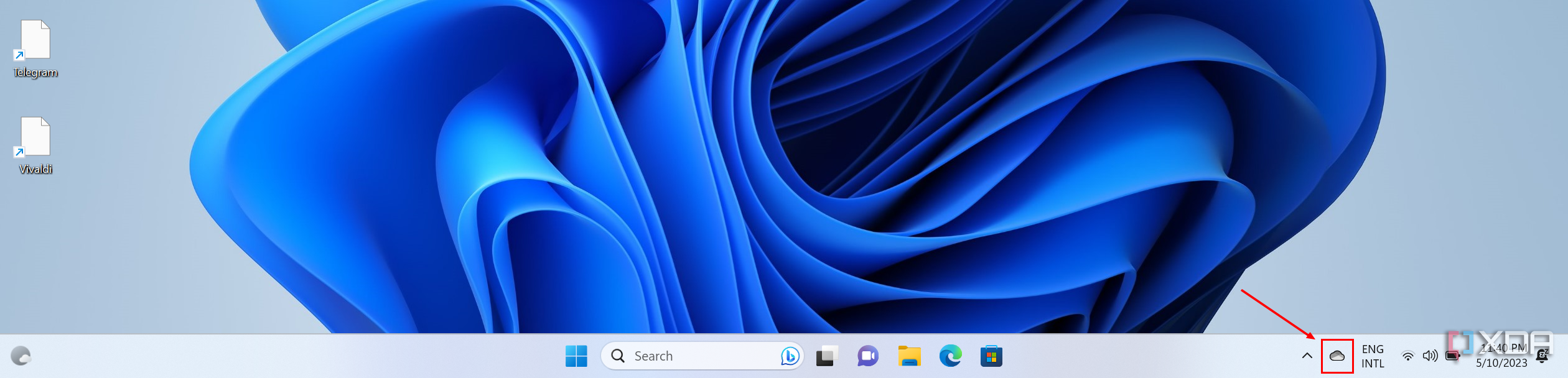 اسکرین شات از نوار وظیفه ویندوز 11 با نماد OneDrive برجسته شده است