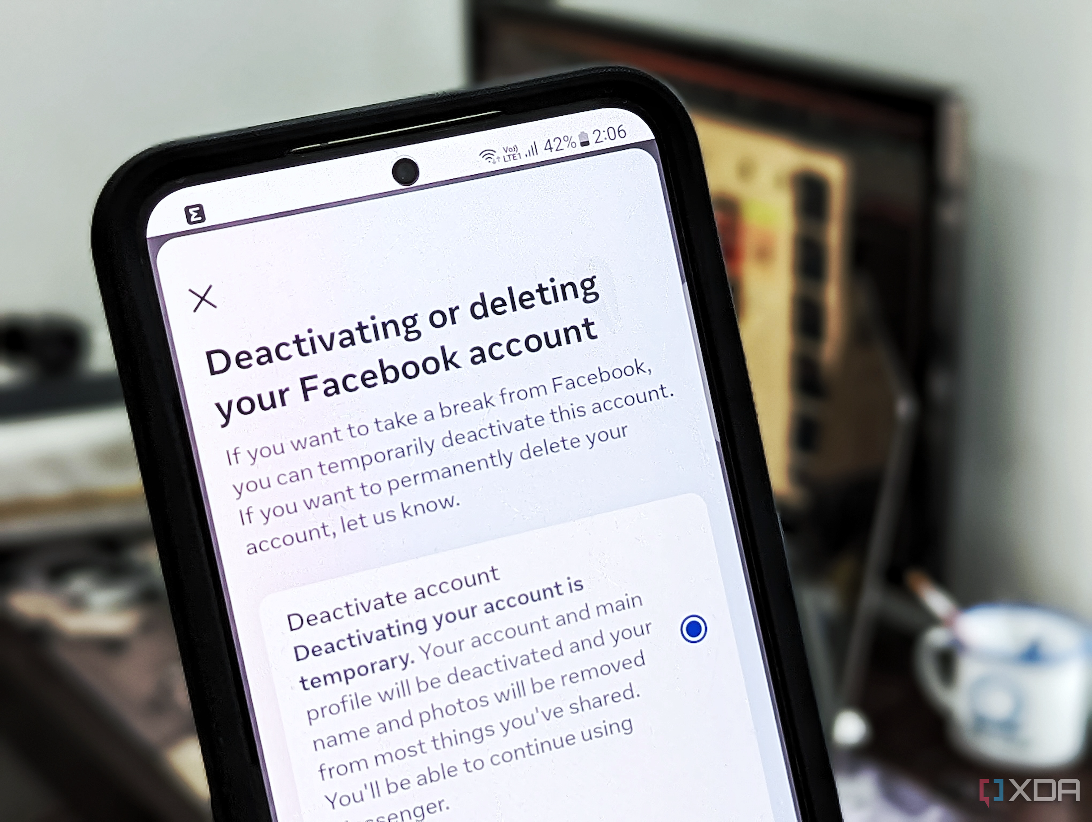 An image of a phone displaying the options to deactivate or delete your Facebook account.